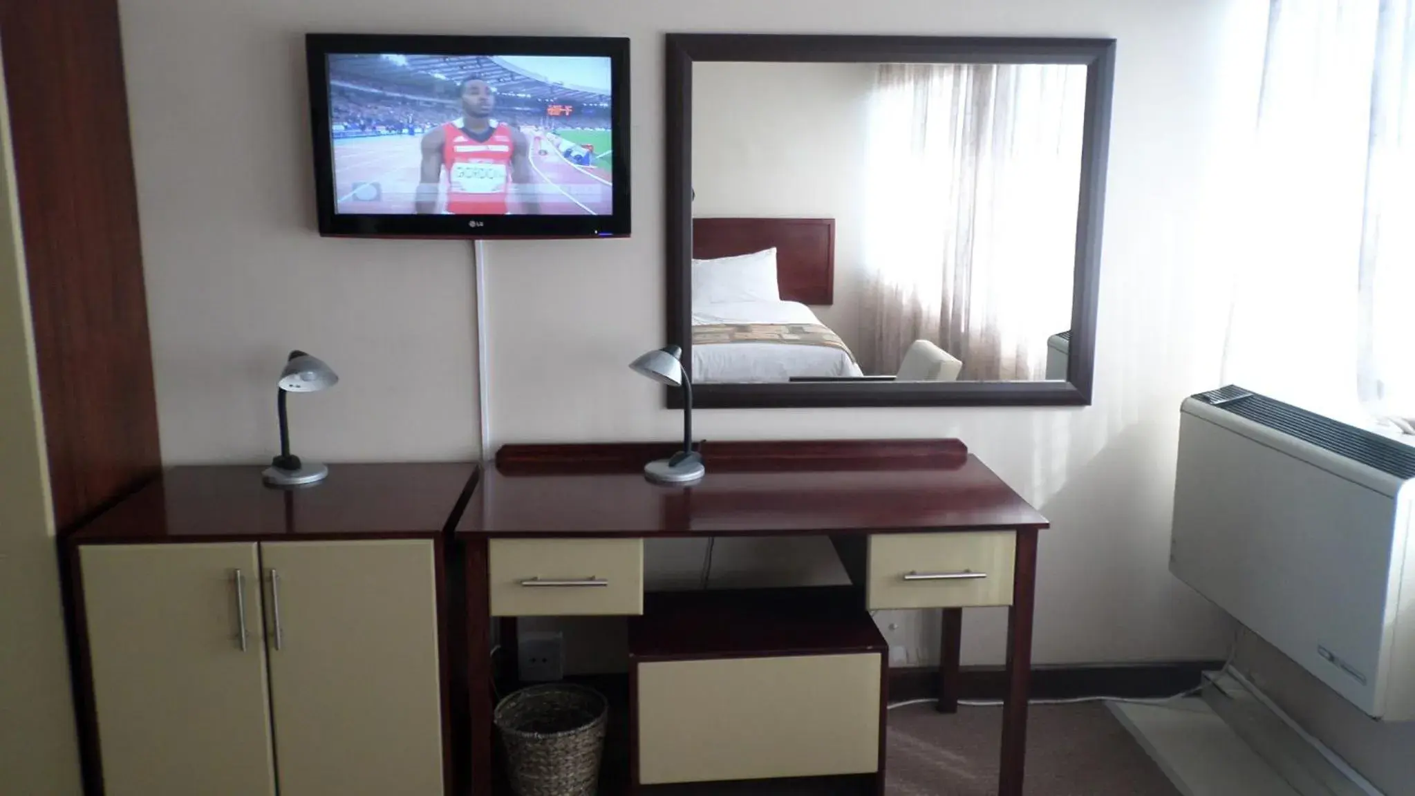 Seating area, TV/Entertainment Center in Coastlands Durban Self Catering Holiday Apartments