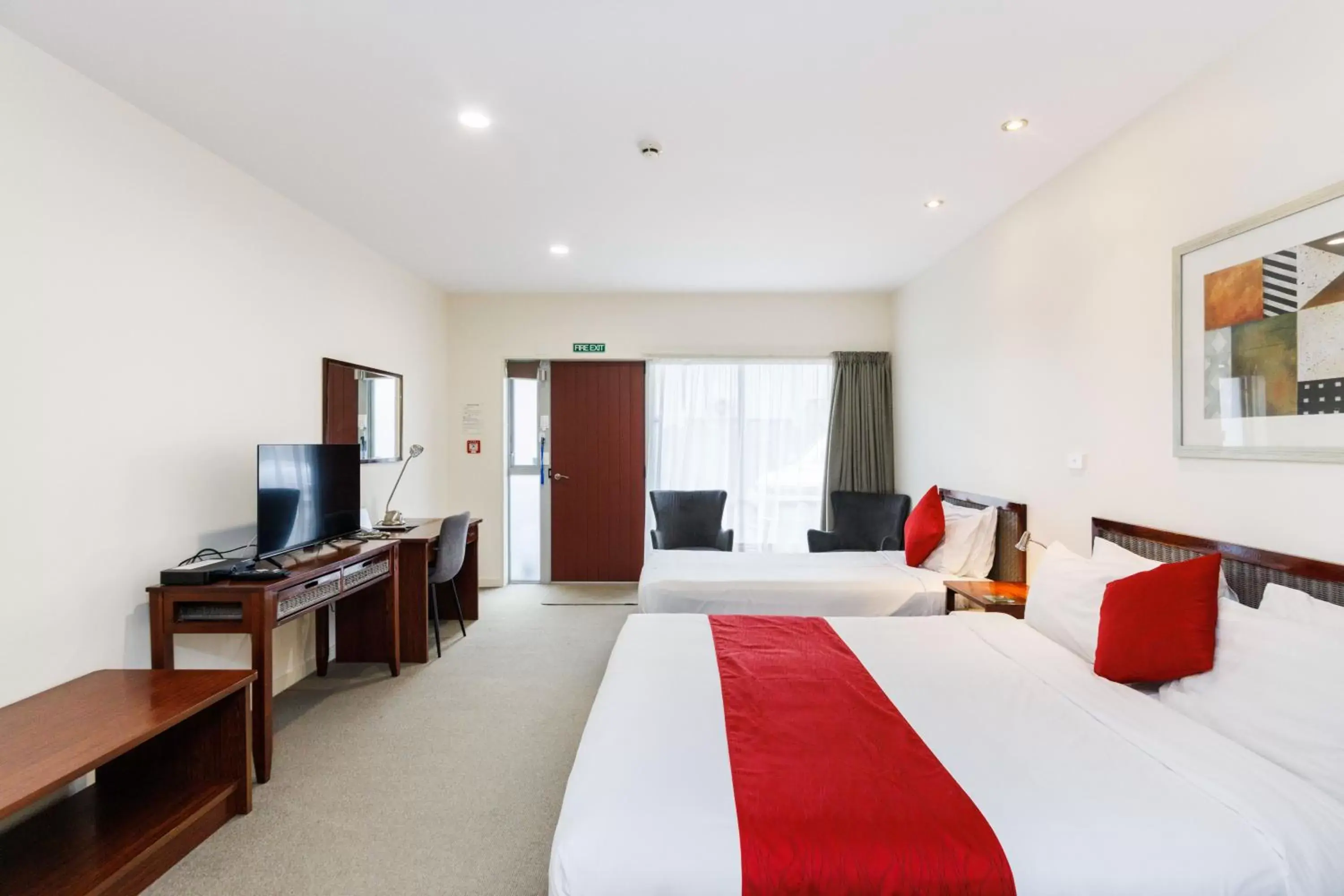 Bedroom, TV/Entertainment Center in Fitzherbert Regency Motor Lodge