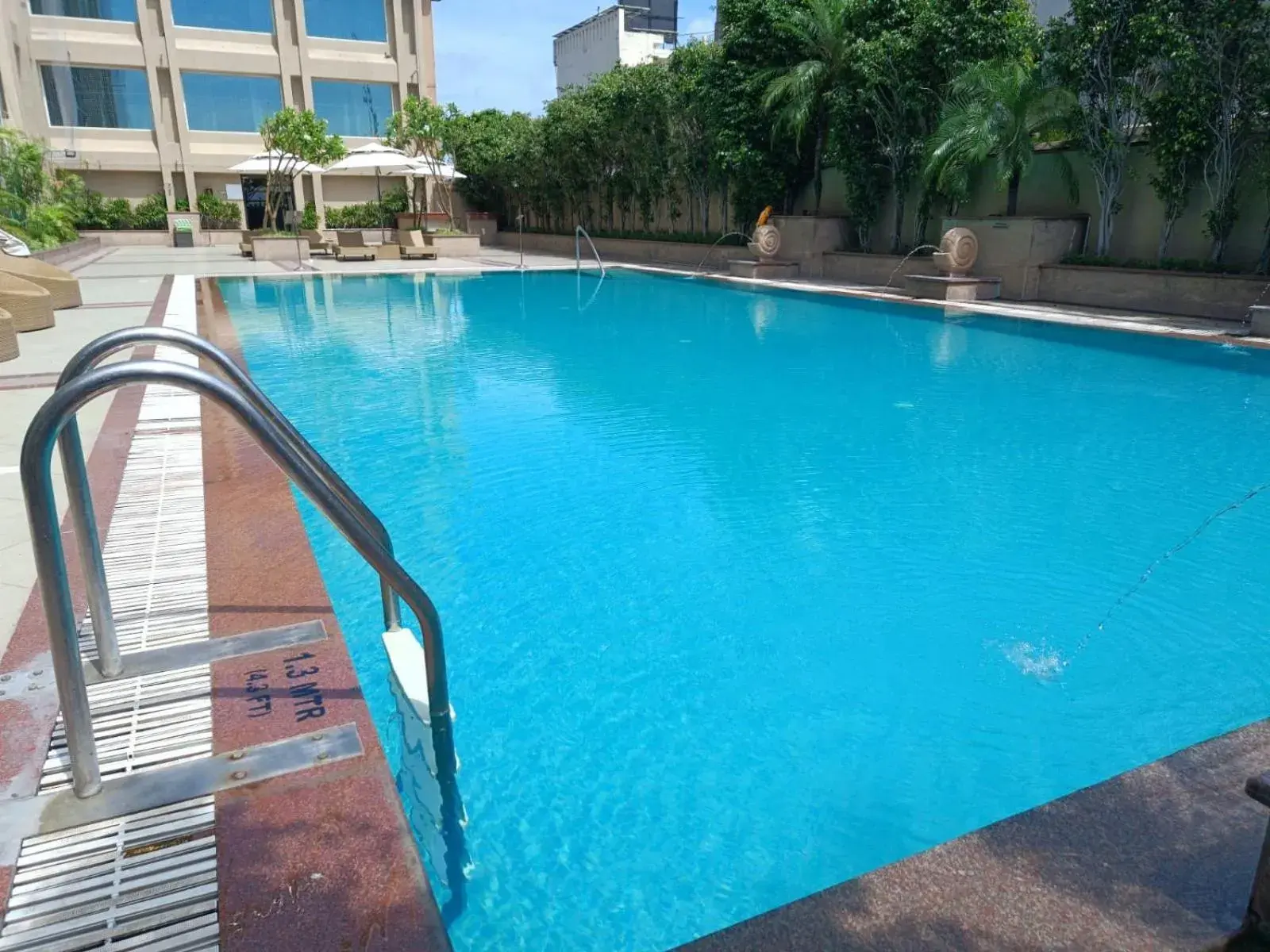 , Swimming Pool in Holiday Inn Amritsar Ranjit Avenue, an IHG Hotel