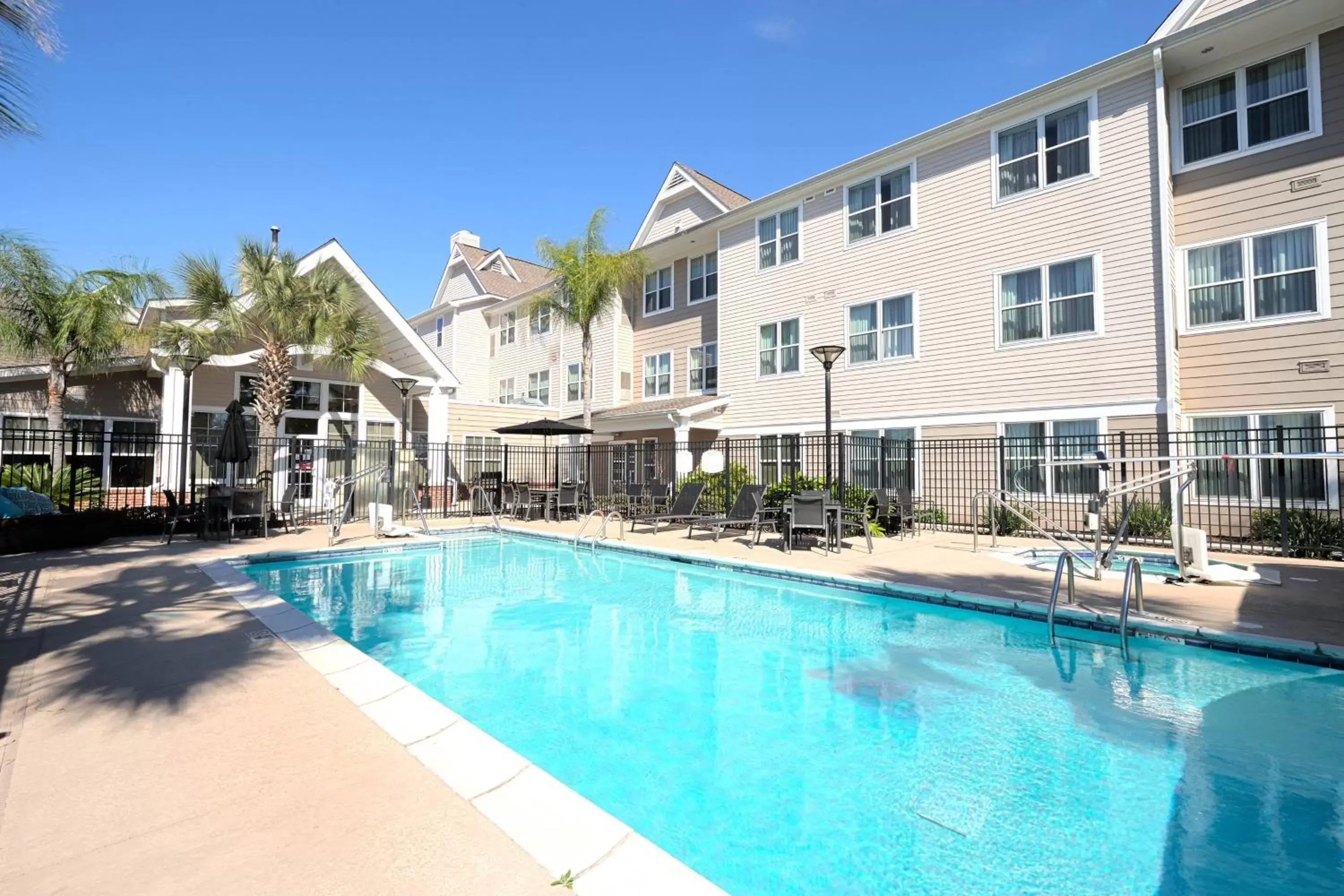 Swimming pool, Property Building in Residence Inn Lafayette Airport