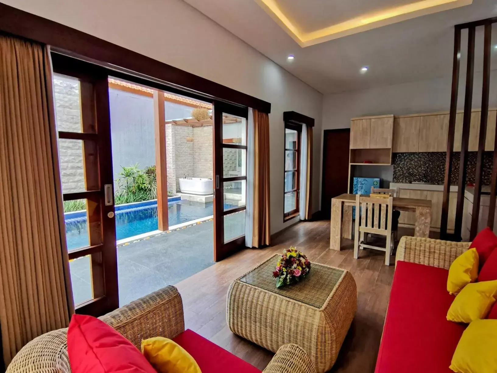 Living room, Pool View in Kuta Puri Bungalows, Villas and Resort