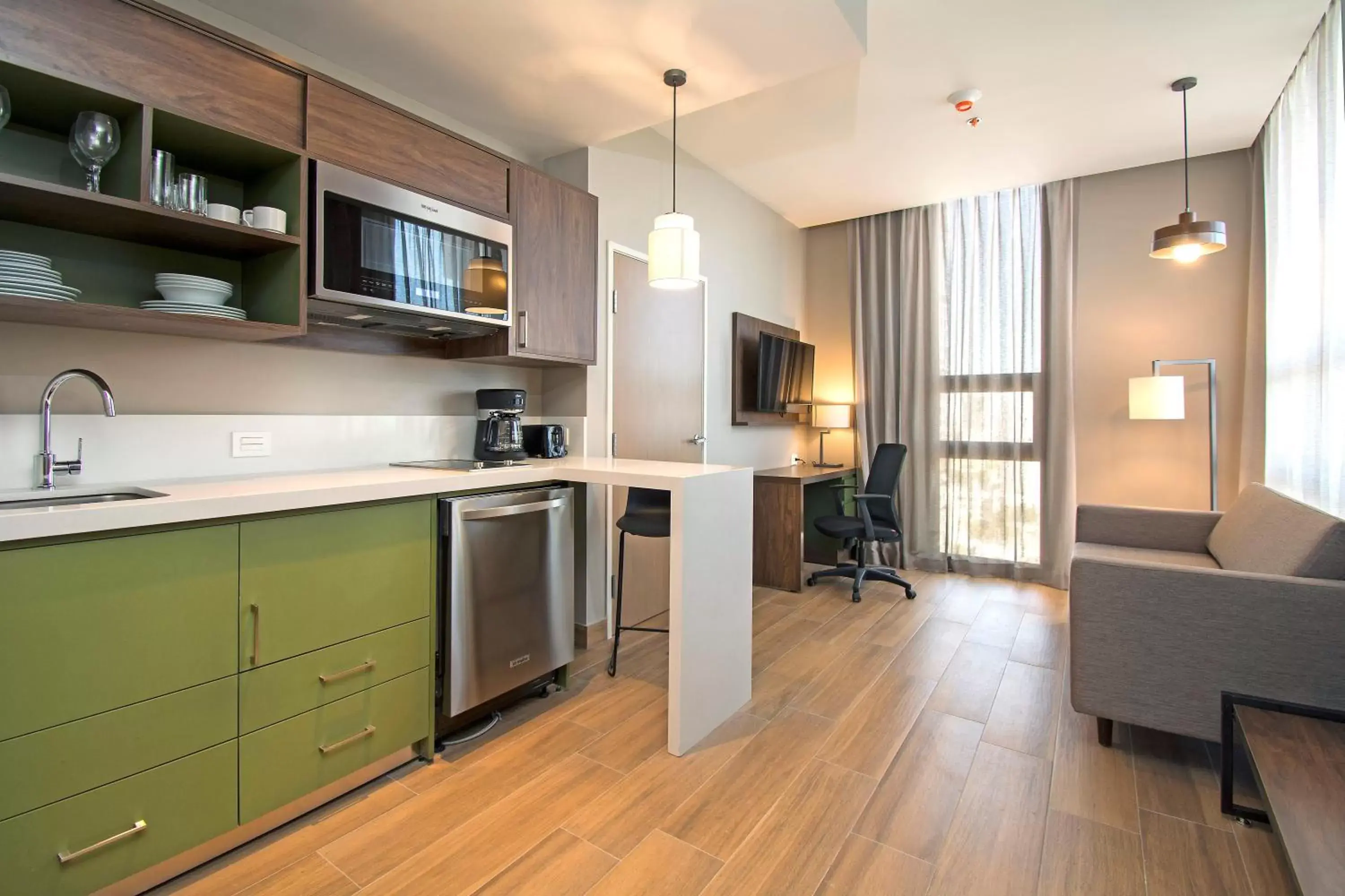 Photo of the whole room, Kitchen/Kitchenette in Staybridge Suites - Guadalajara Novena, an IHG Hotel