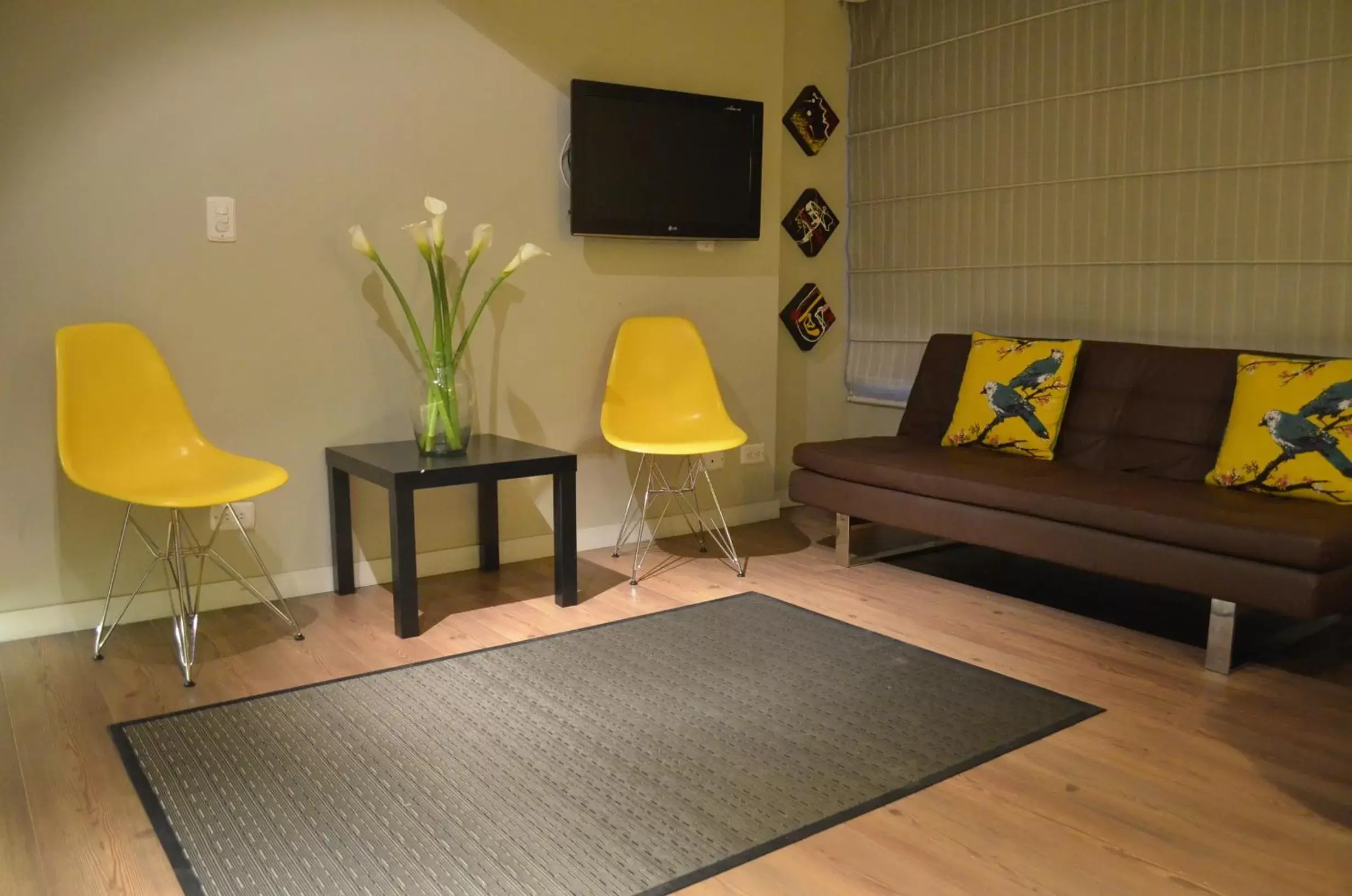 Bedroom, Seating Area in Hotel Living 55