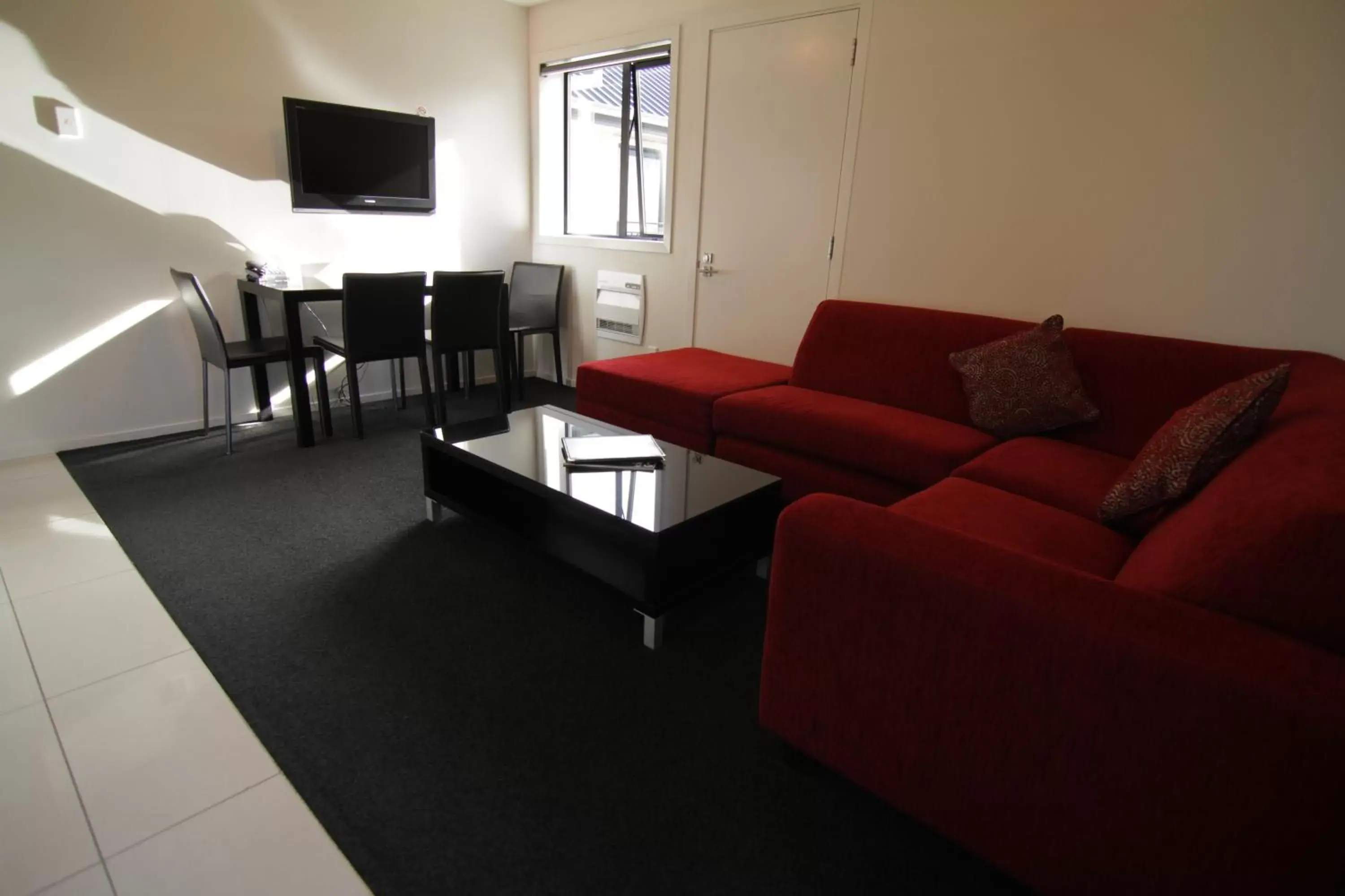 TV and multimedia, Seating Area in Metropolitan Motel on Riccarton