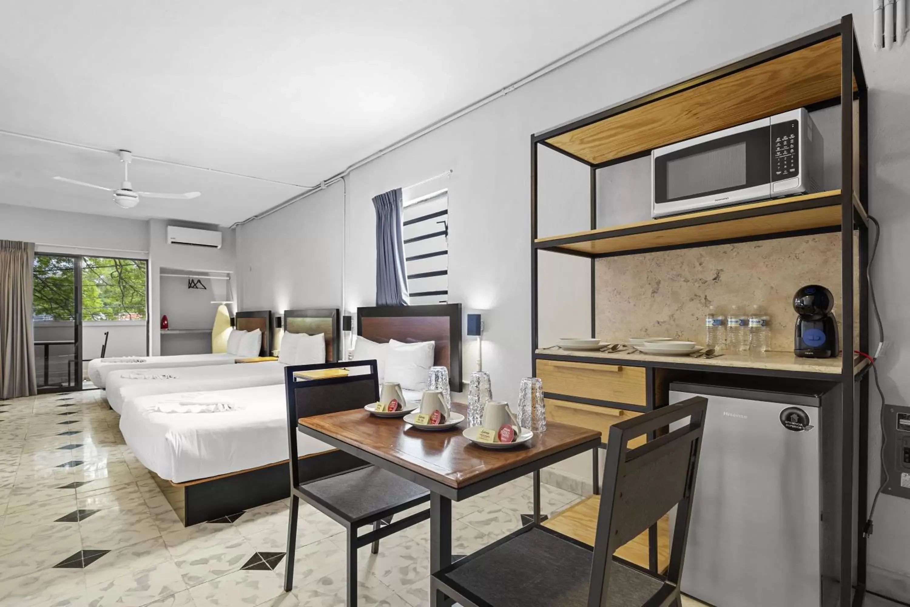 Bedroom, Kitchen/Kitchenette in Suites Reforma by HomiRent