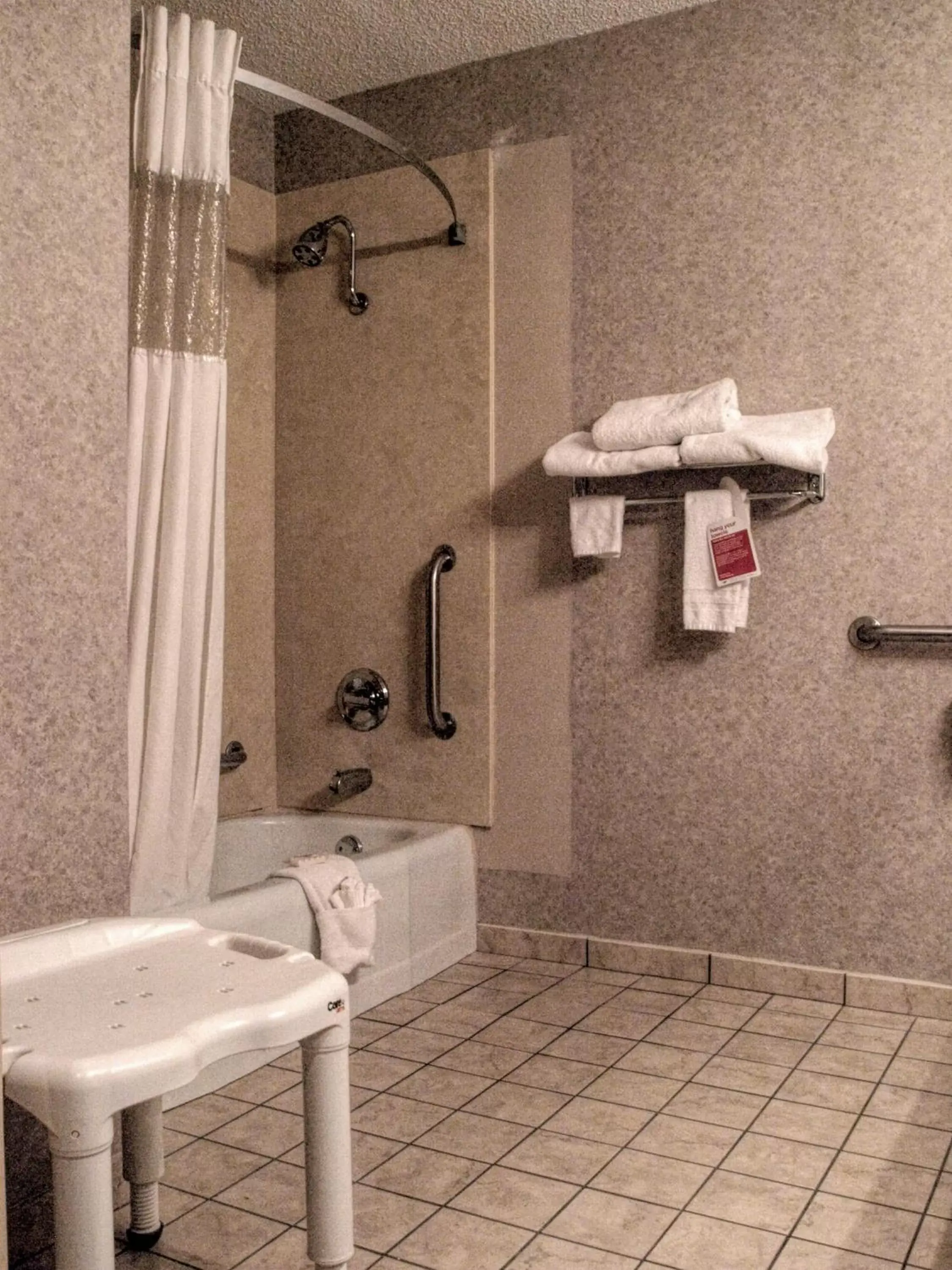 Shower, Bathroom in Ramada by Wyndham Topeka Downtown Hotel & Convention Center