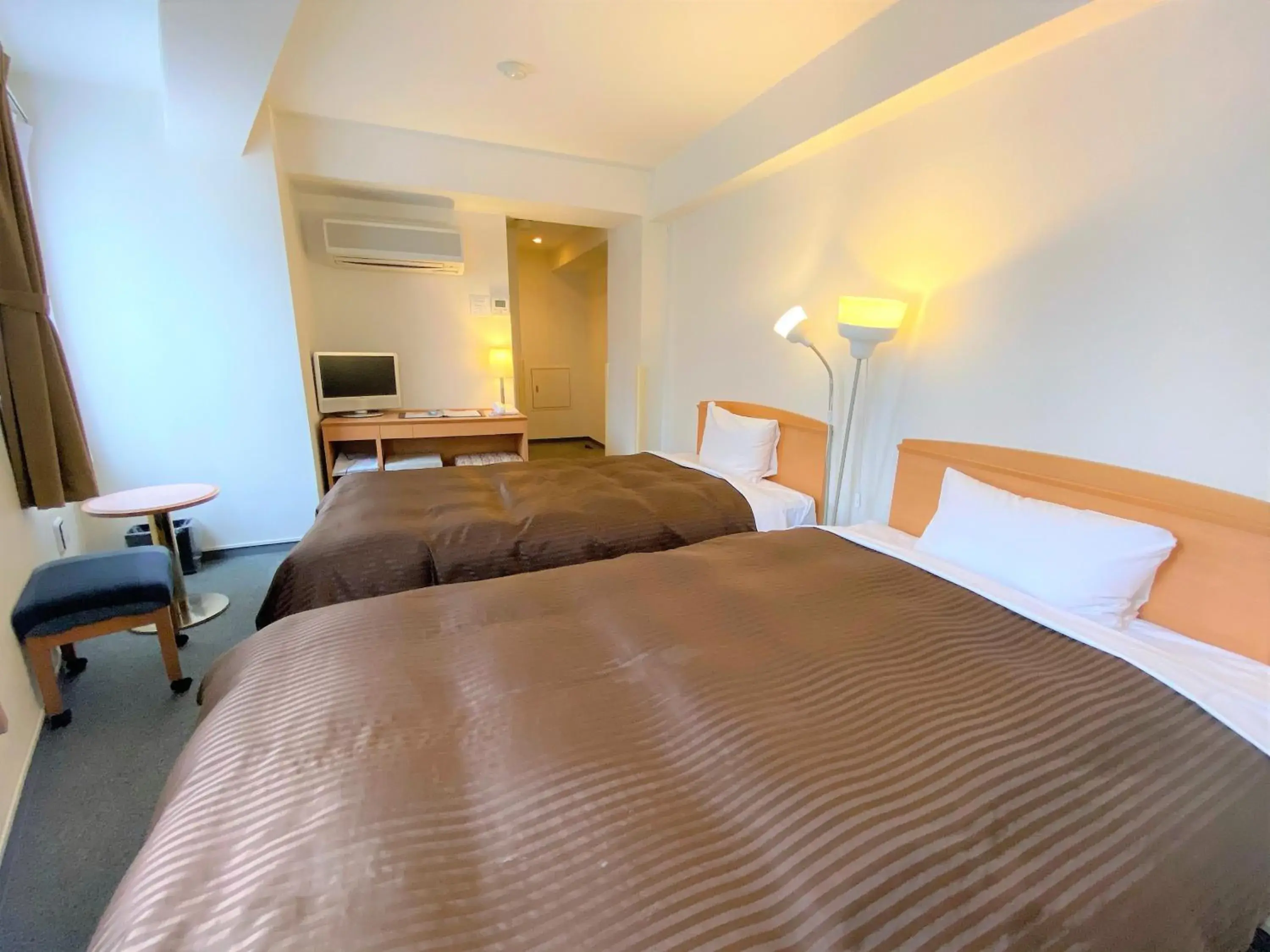 Bed in Sakura Hotel Hatagaya