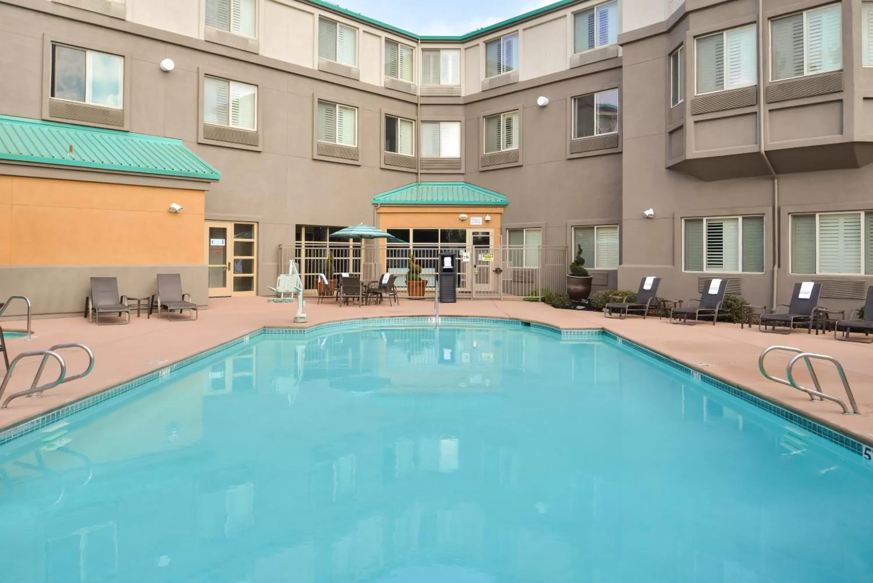 Swimming Pool in HOLIDAY INN EXPRESS & SUITES ELK GROVE CENTRAL - HWY 99, an IHG Hotel
