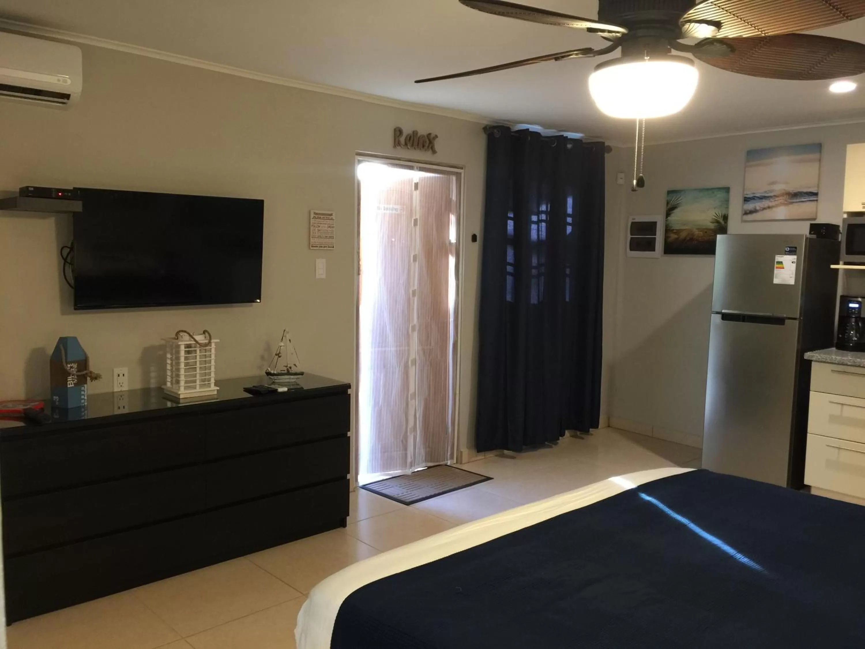 Bed in The Pier Beach Inn & Suites