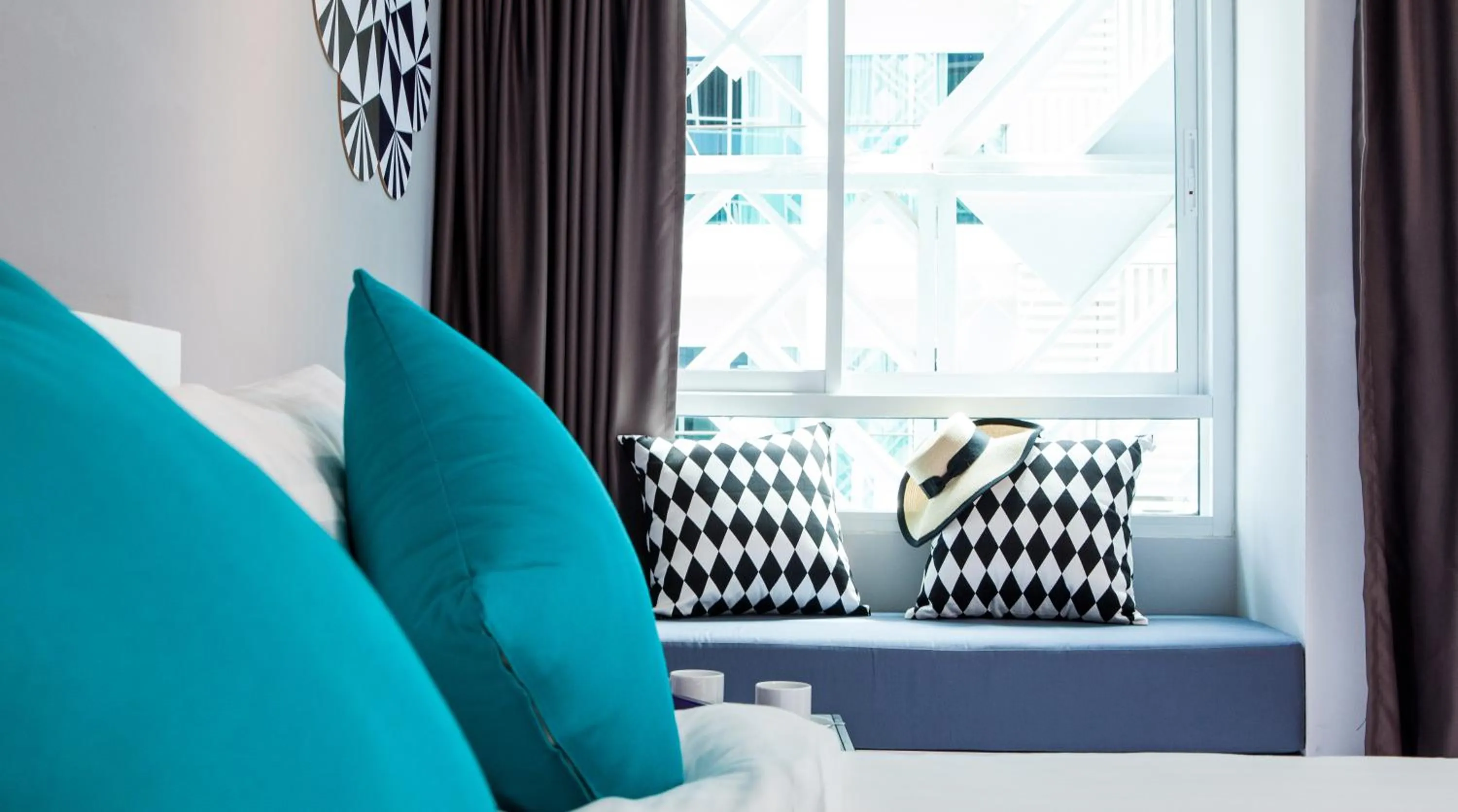 Decorative detail, Bed in The Crib Patong - SHA Certified