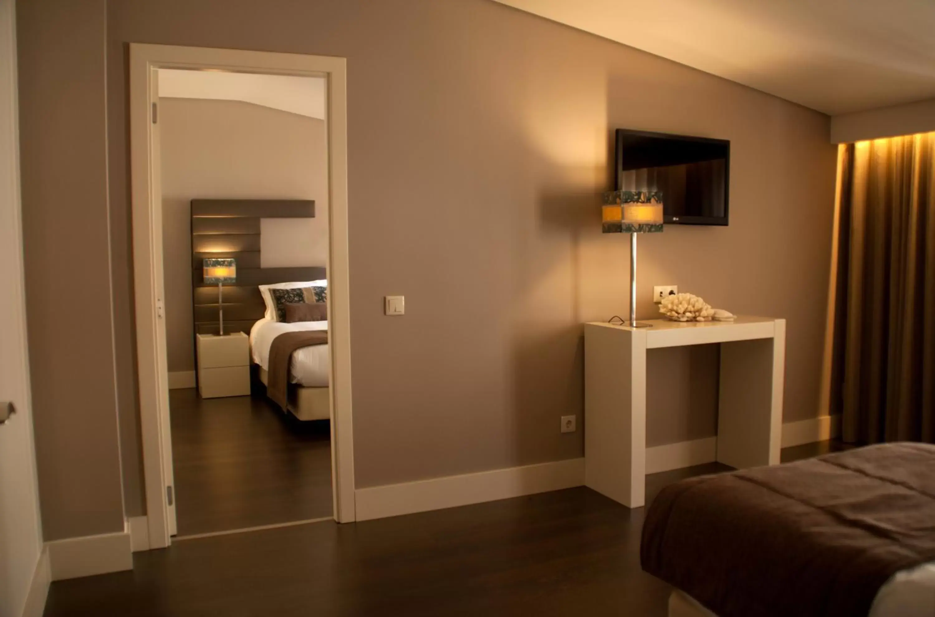 Bedroom, TV/Entertainment Center in Aqua Ria Boutique Hotel