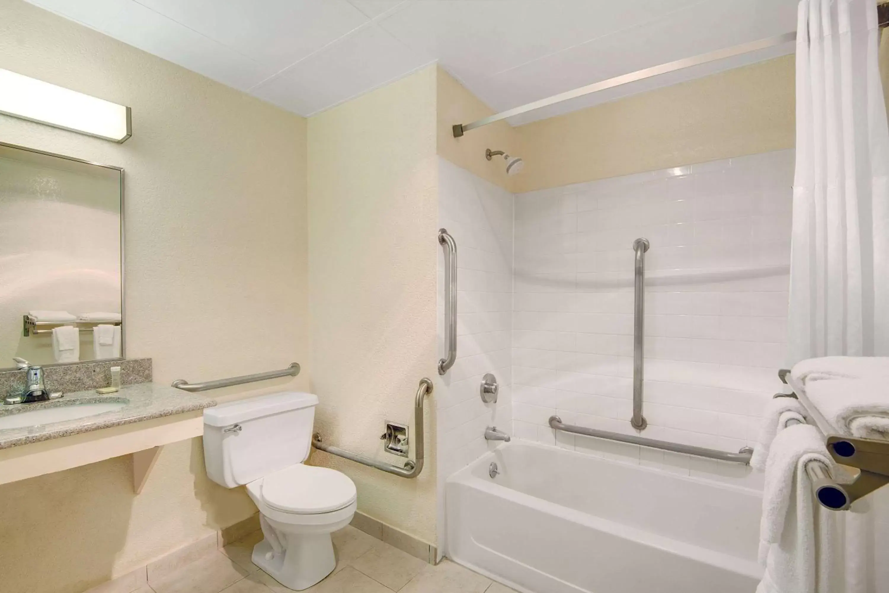 Bathroom in Super 8 by Wyndham Stamford/New York City Area