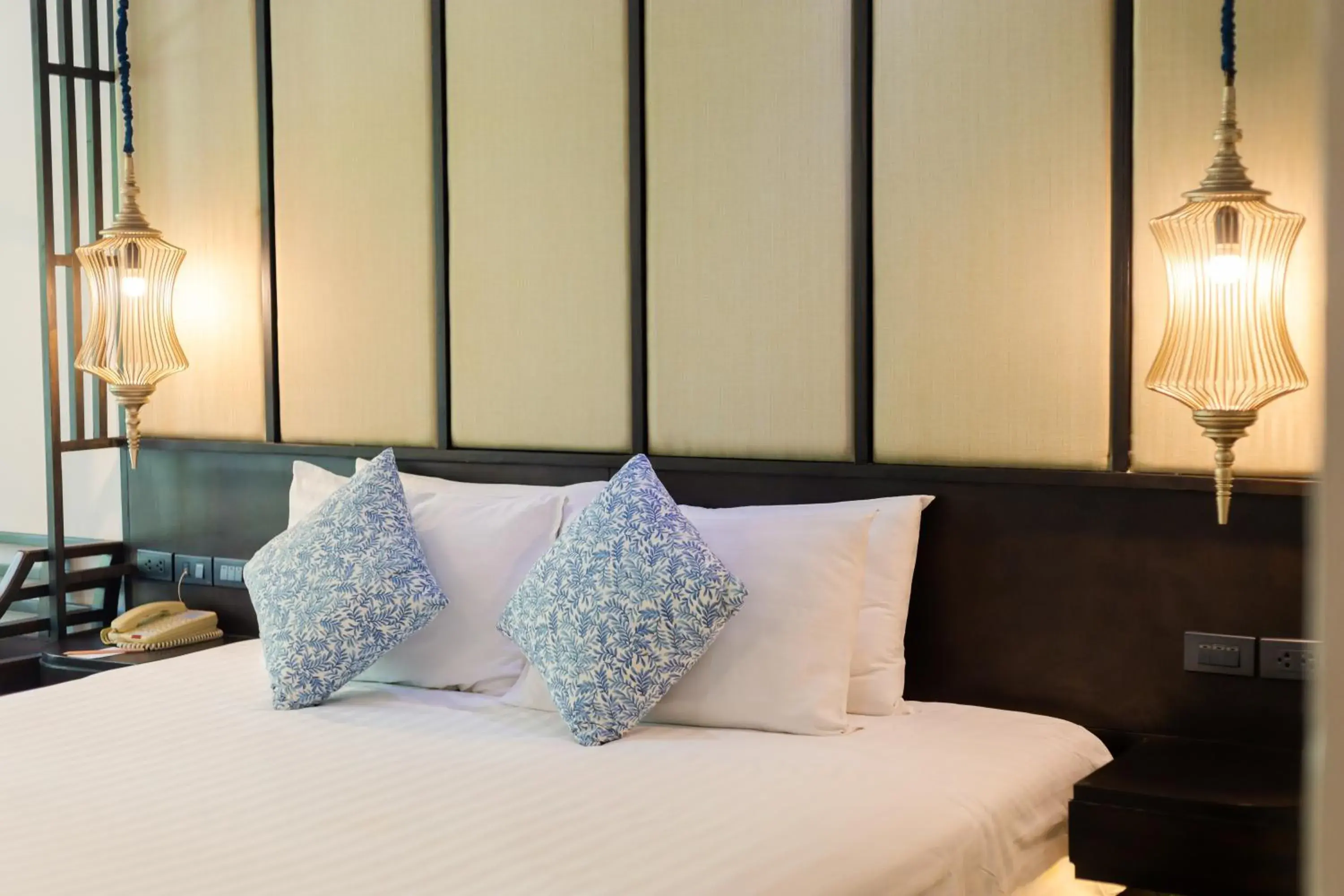 Bed in Ravindra Beach Resort & Spa - SHA Extra Plus