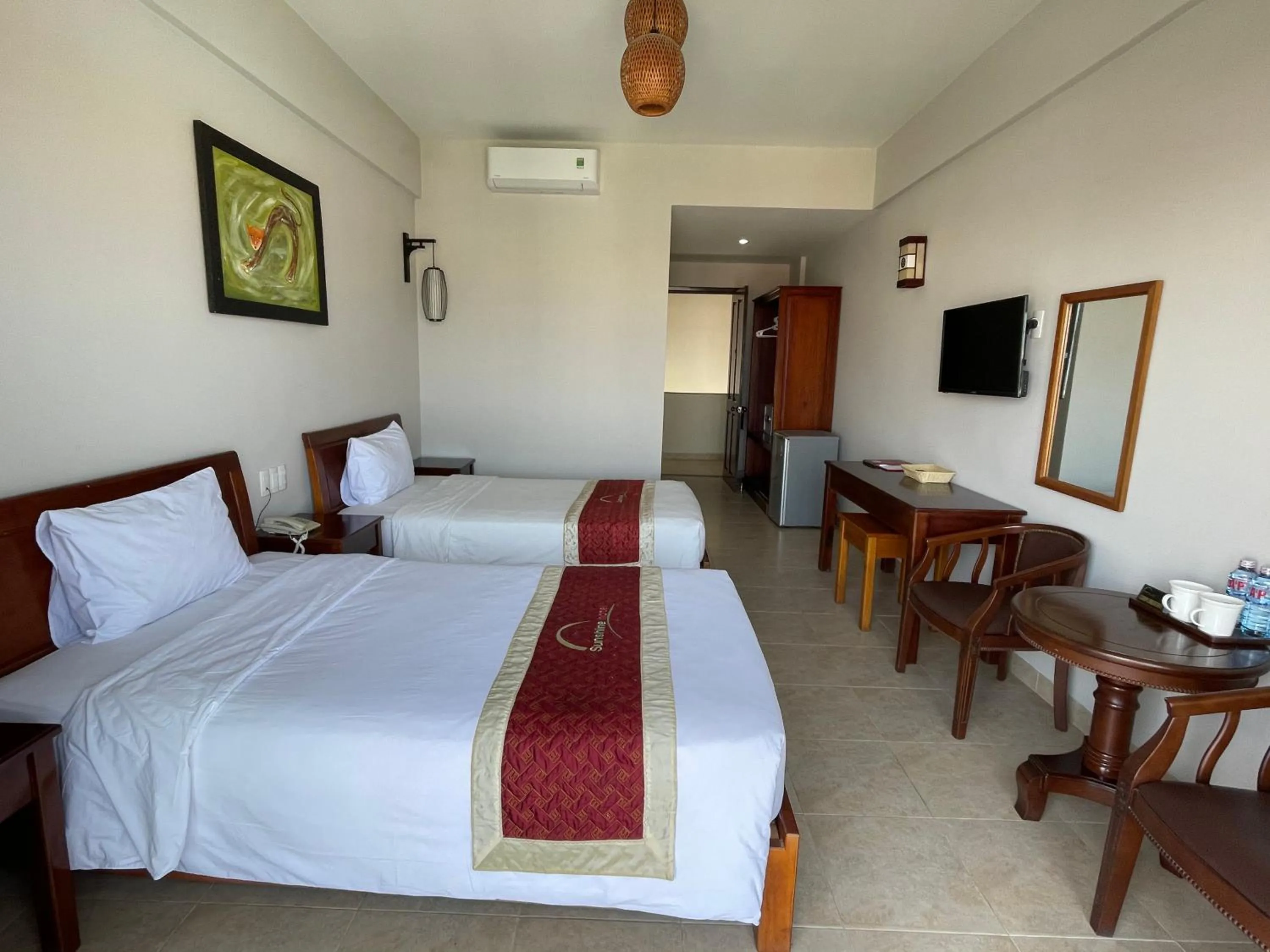 Bed in Sunshine Hoian Hotel