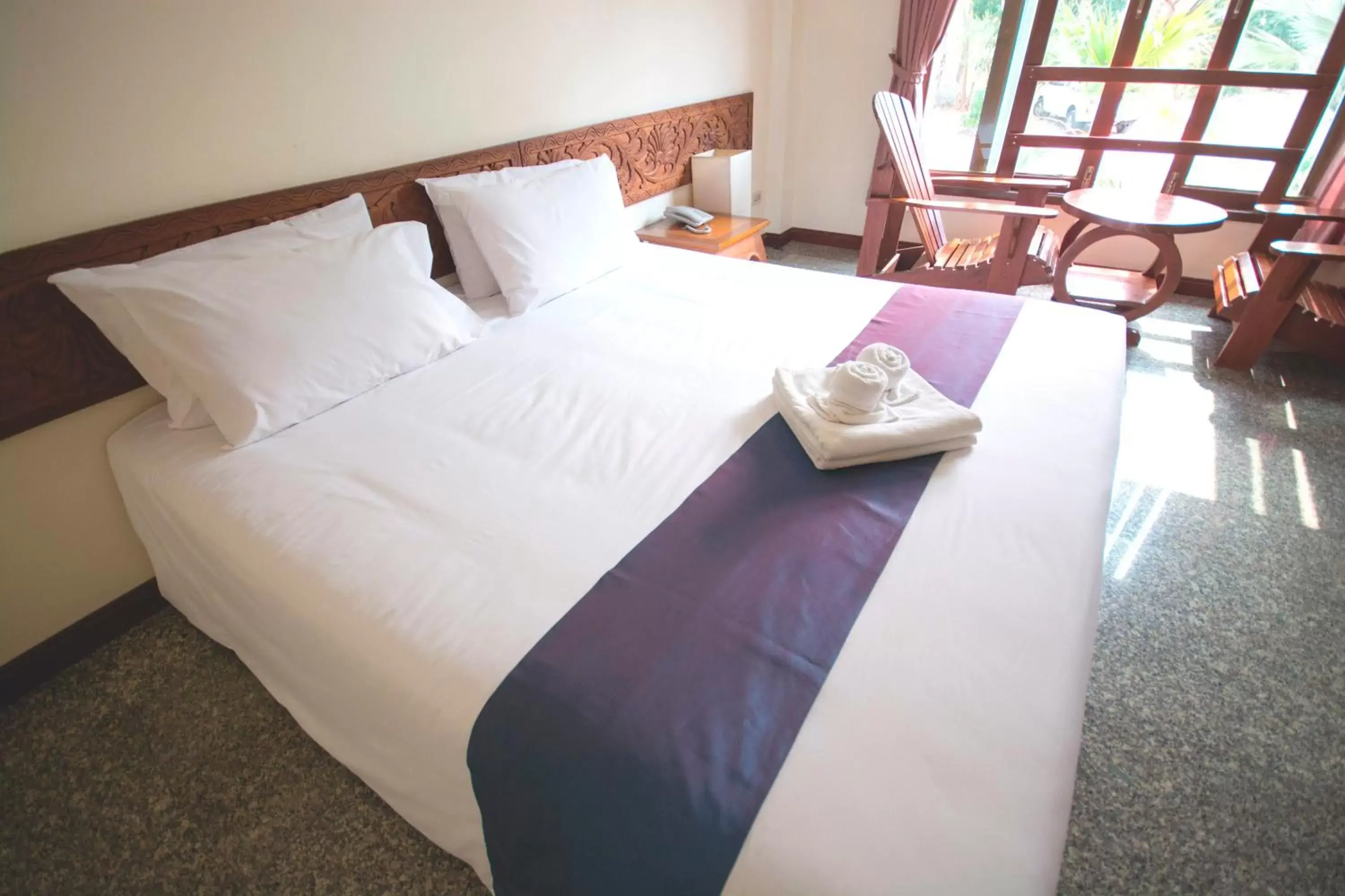 Bed in Tak Andaman Resort & Hotel