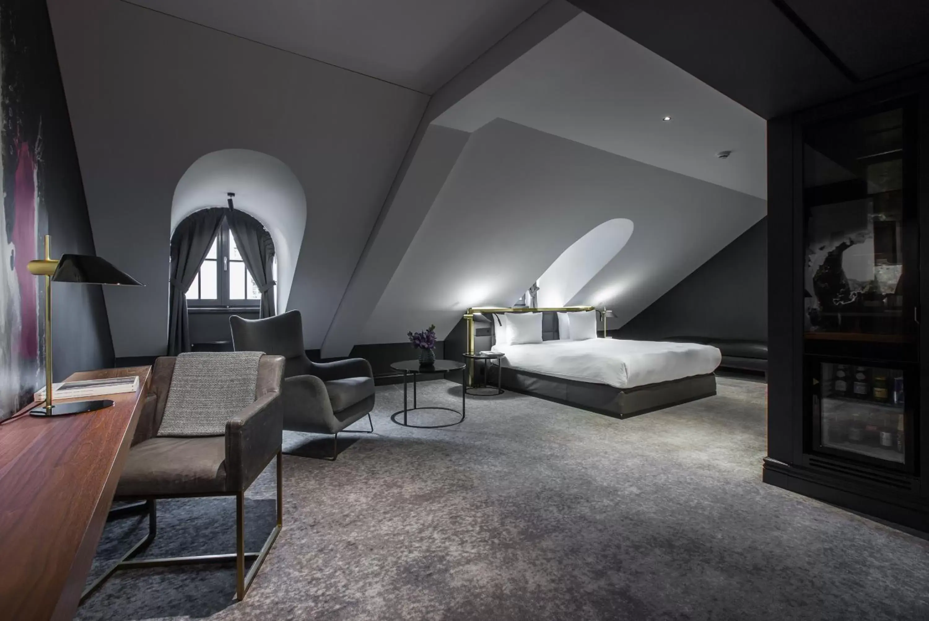 Bedroom, Seating Area in Hotel Pacai, Vilnius, a Member of Design Hotels