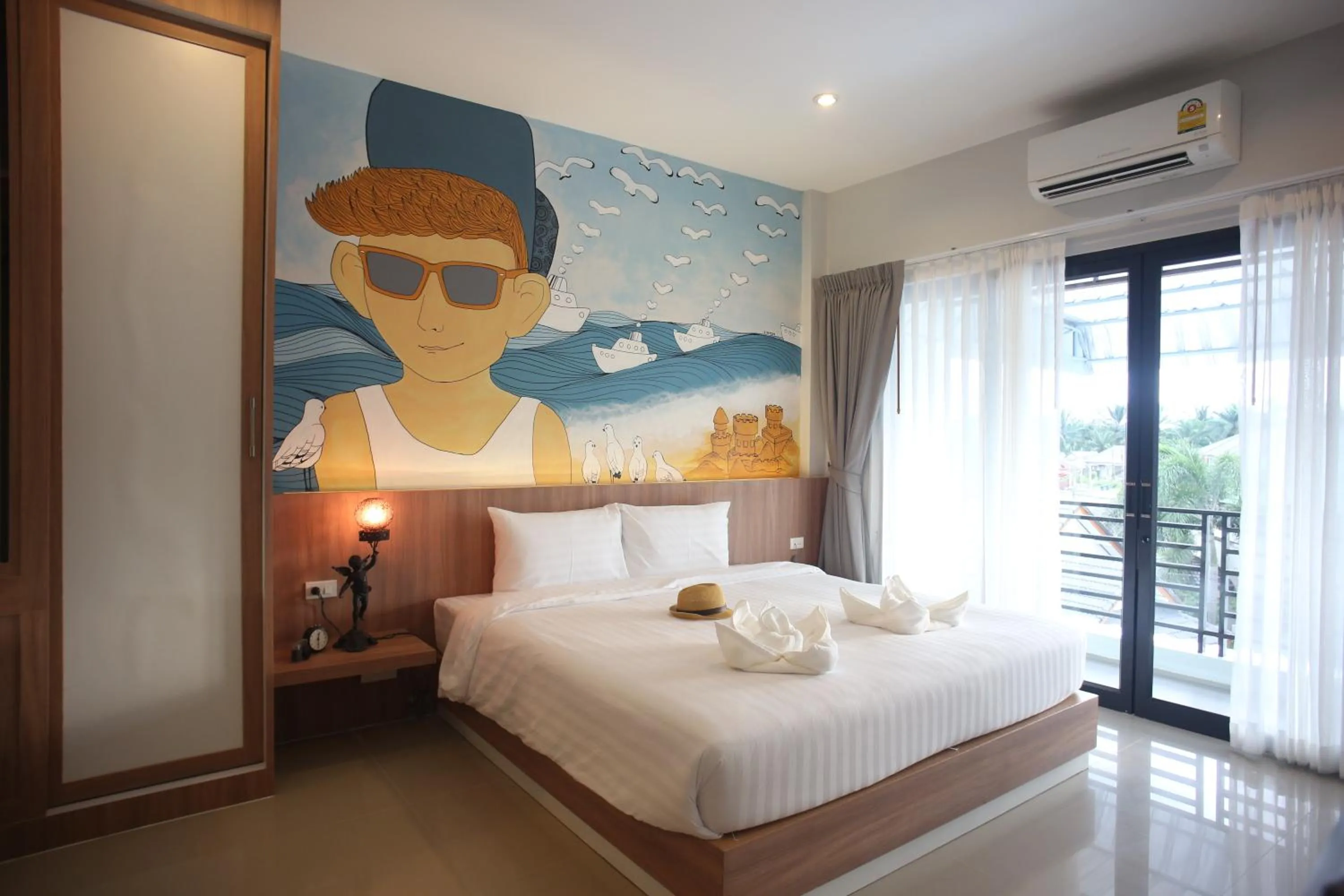 Photo of the whole room, Bed in Tairada Boutique Hotel