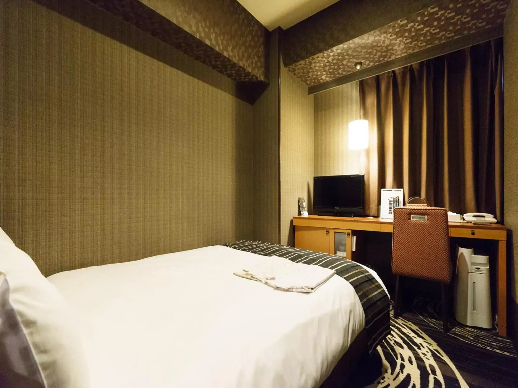 Bed in Sotetsu Fresa Inn Higashi Shinjuku Bed in Sotetsu Fresa Inn Higashi Shinjuku