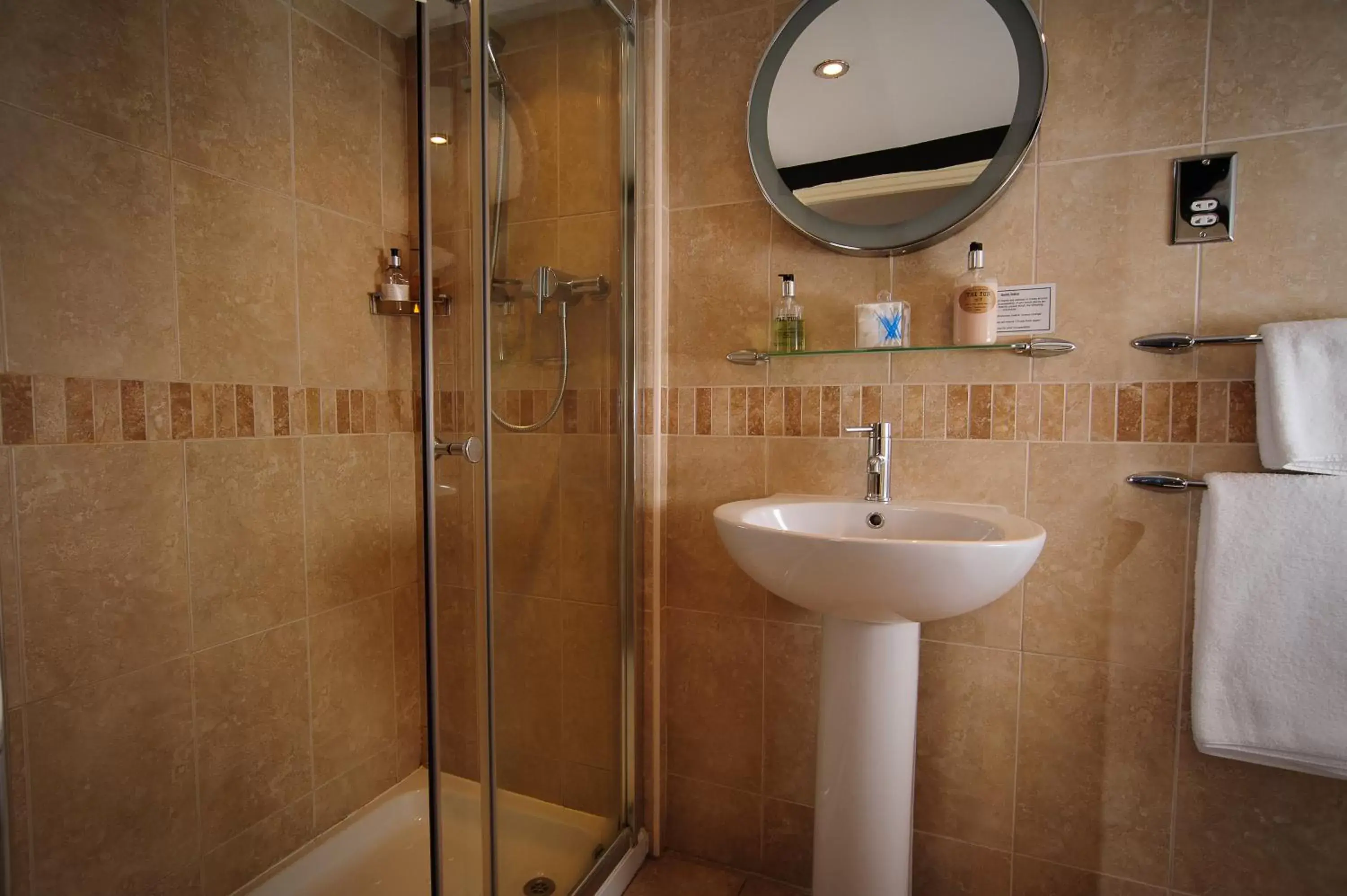 Bathroom in Roundthorn Country House & Luxury Apartments