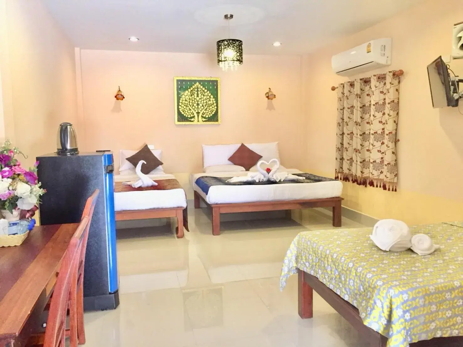 Bed in Srisiam Resort