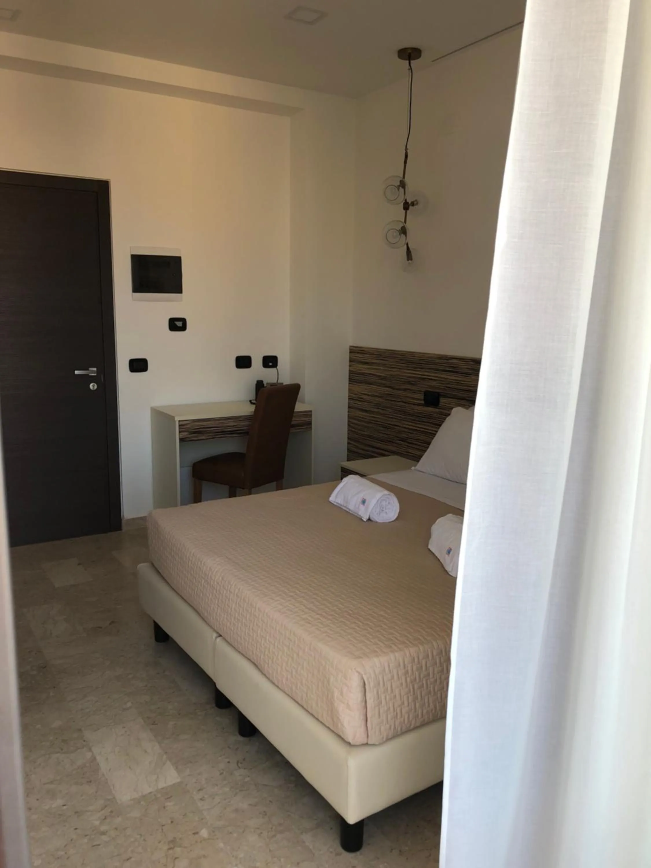 Bed in Albergo Milazzo Inn AiMori