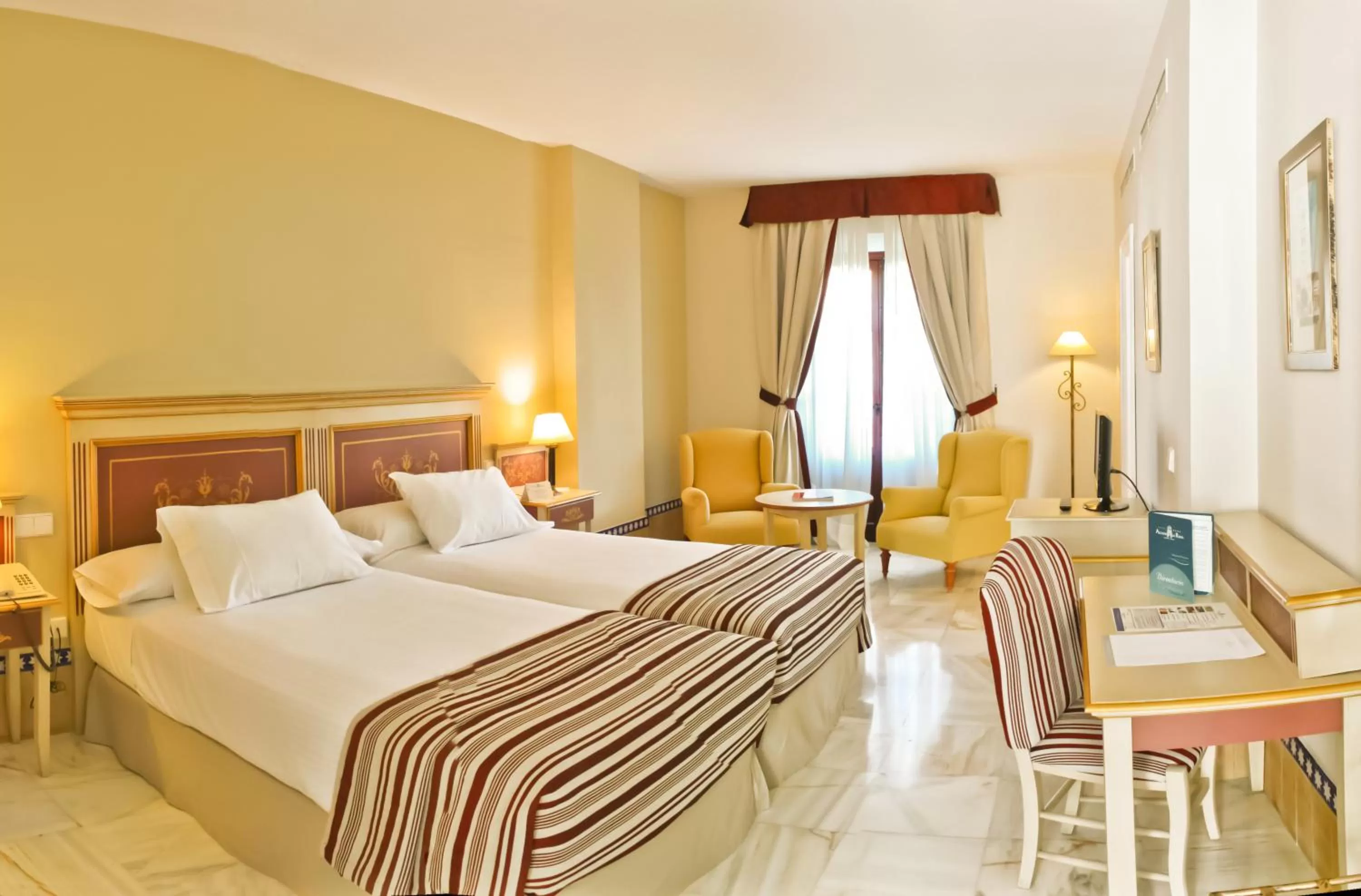 Bed in Hotel Alcázar de la Reina