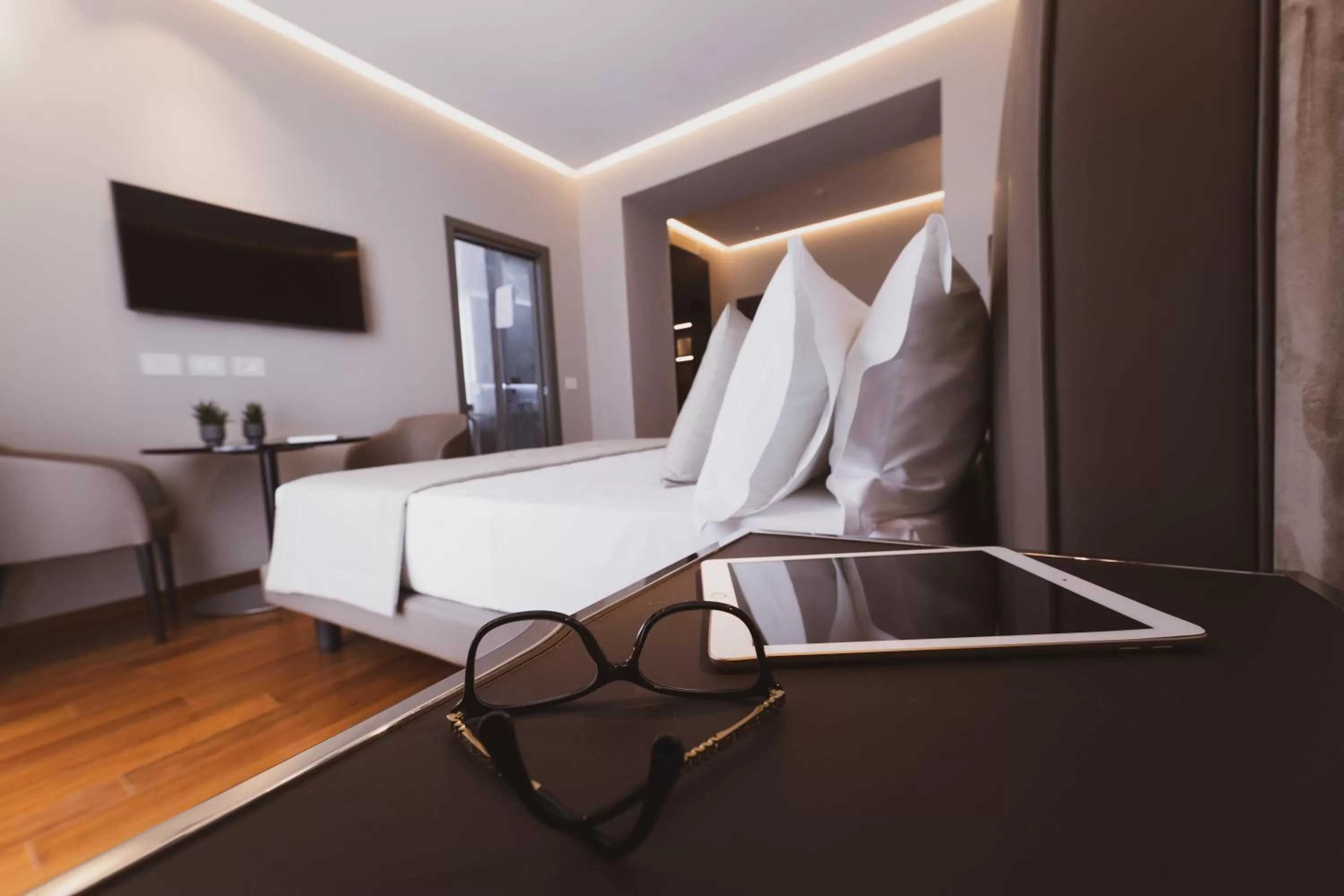 Bed in Callistos Hotel & Spa