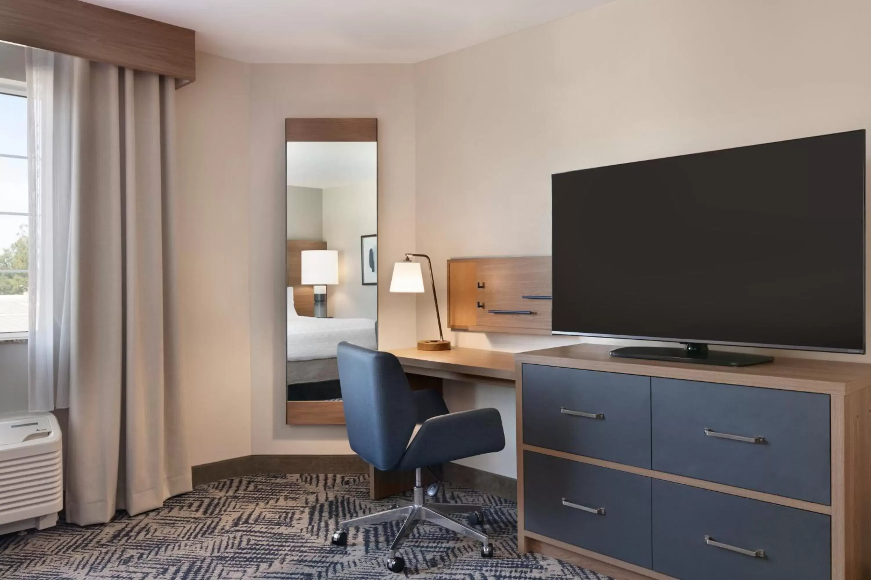 TV/Entertainment Center in Candlewood Suites Kansas City Northeast, an IHG Hotel