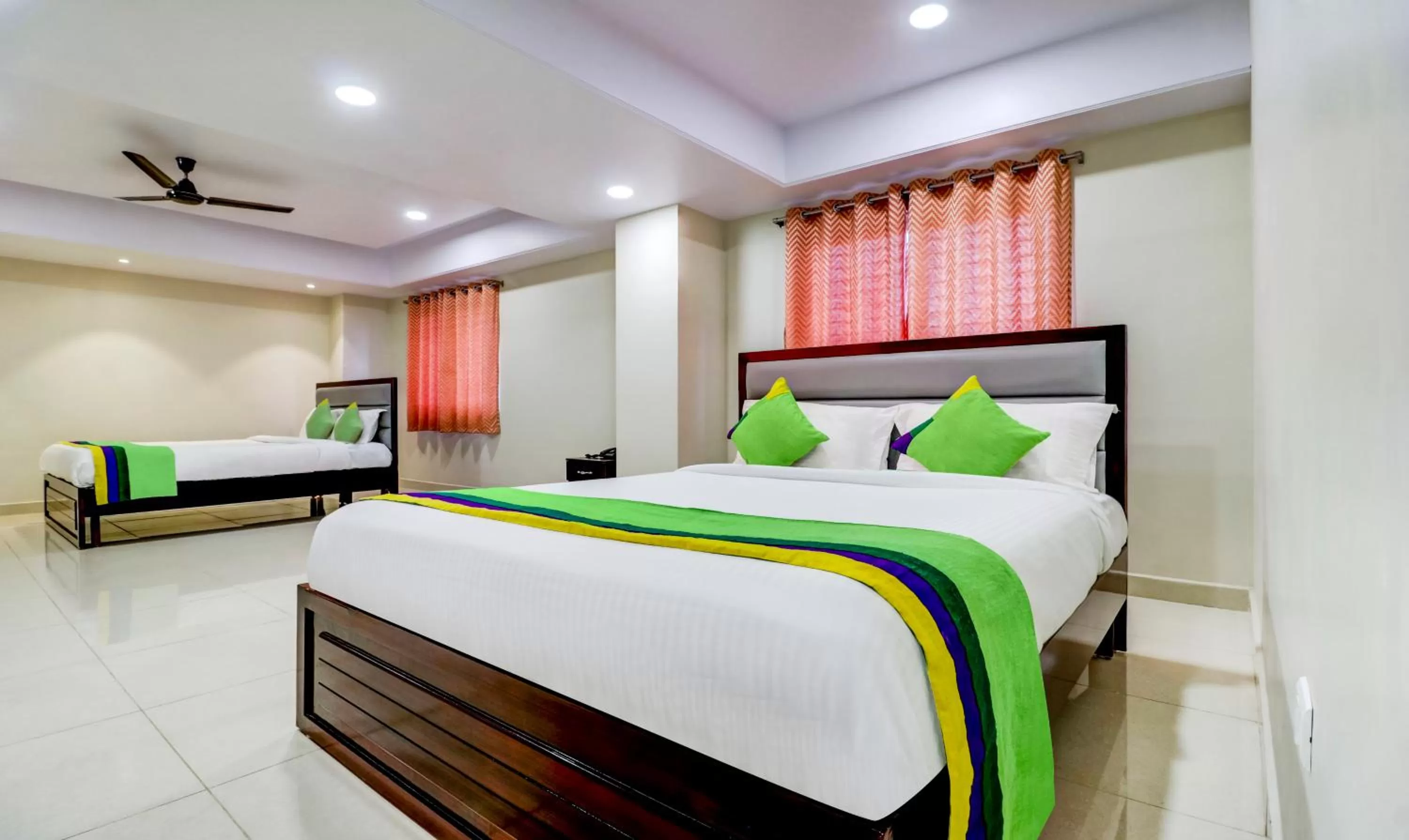 Bedroom, Bed in Treebo Grand Milan