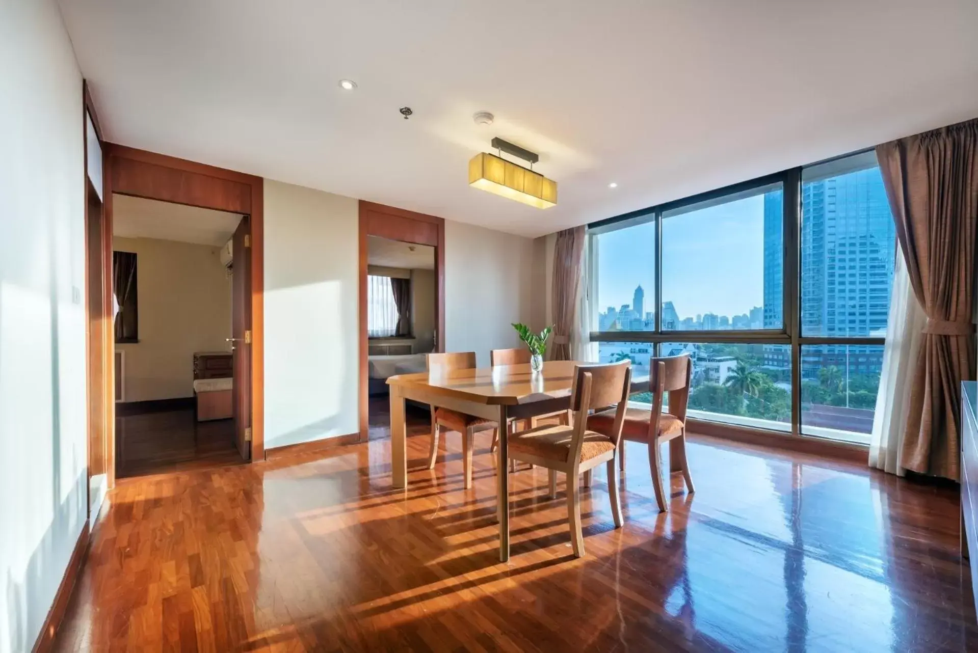 Living room, Dining Area in Bandara Suites Silom, Bangkok - SHA Extra Plus