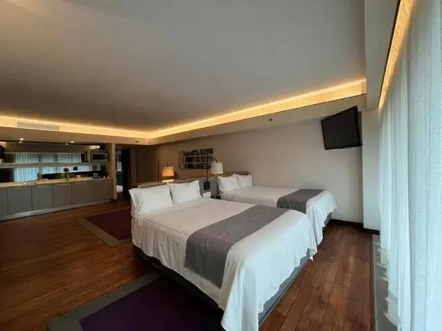 Bed in Las Suites Campos Eliseos