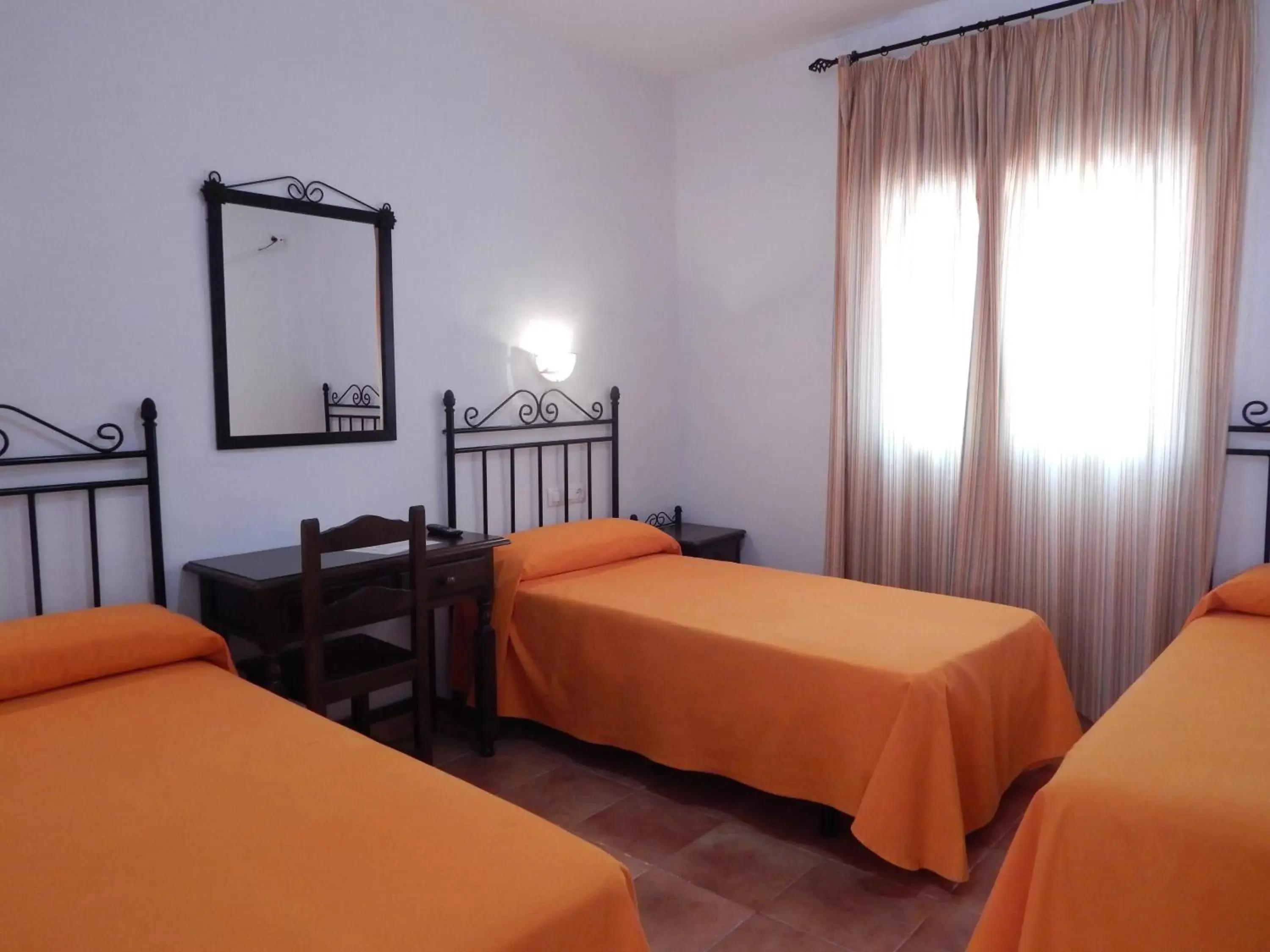 Triple Room in Hotel Cortijo Los Gallos