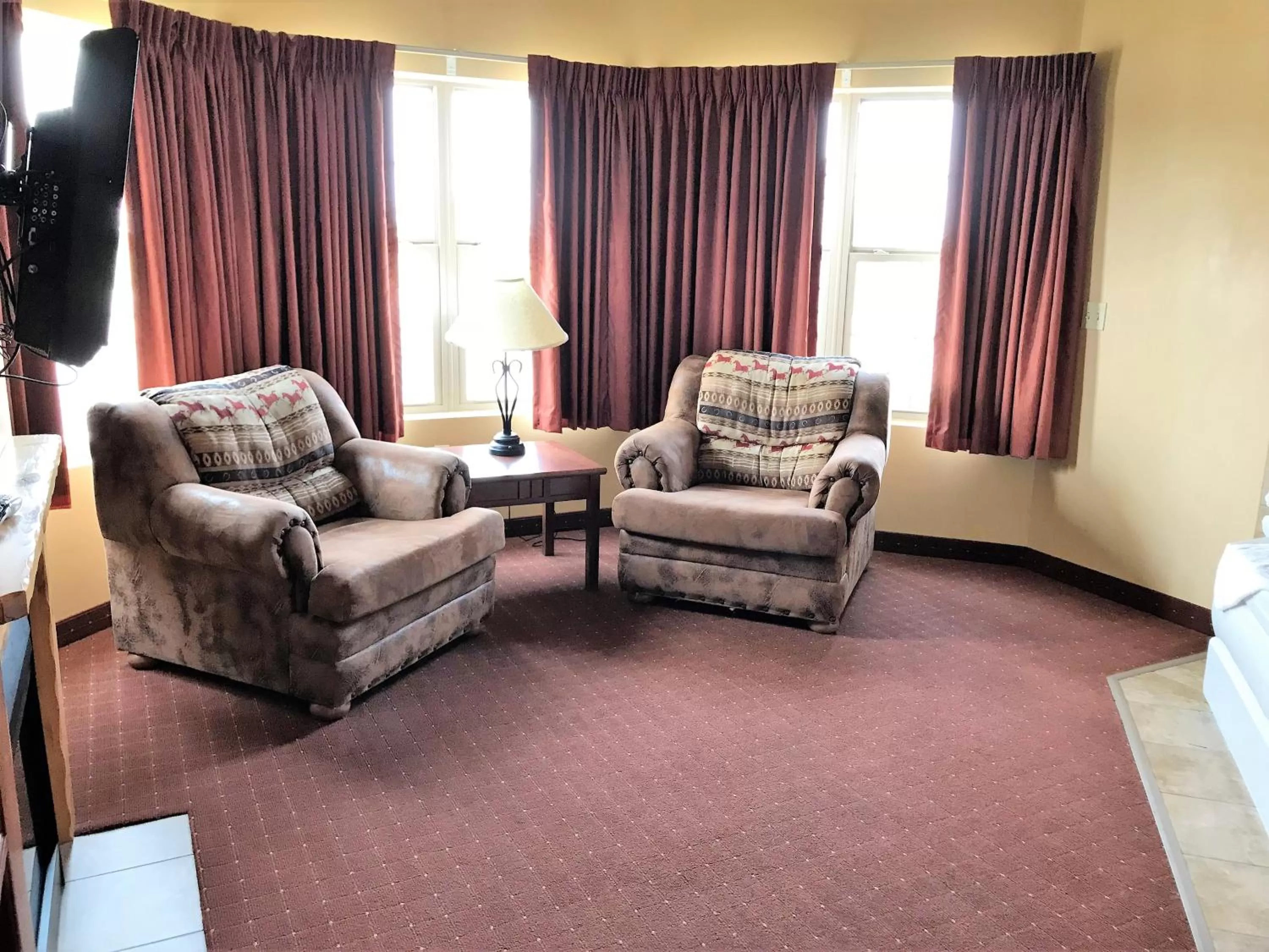 Living room in AmericInn by Wyndham Fargo Medical Center