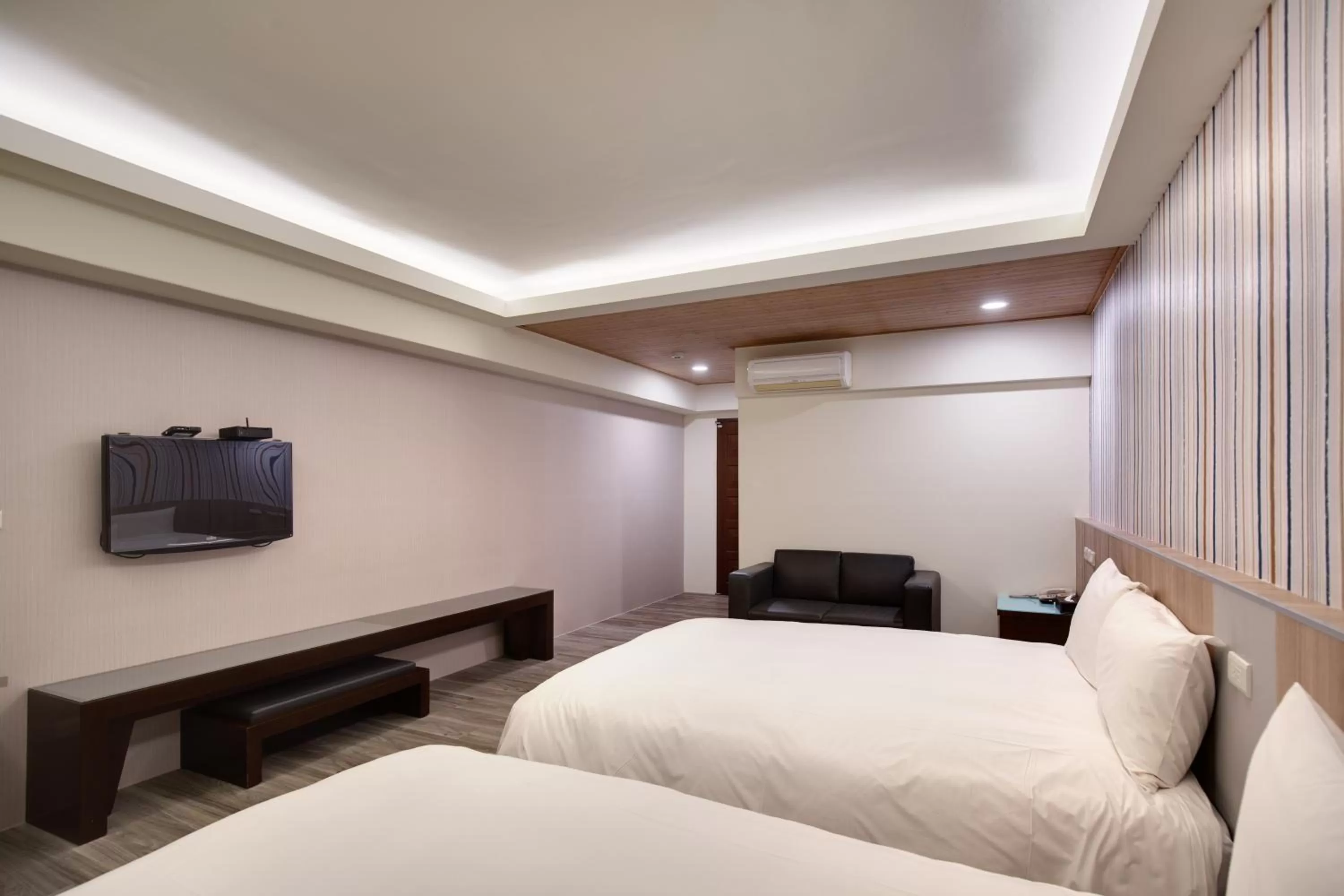 Bed in 天璽商務飯店 Cullinan Hotel