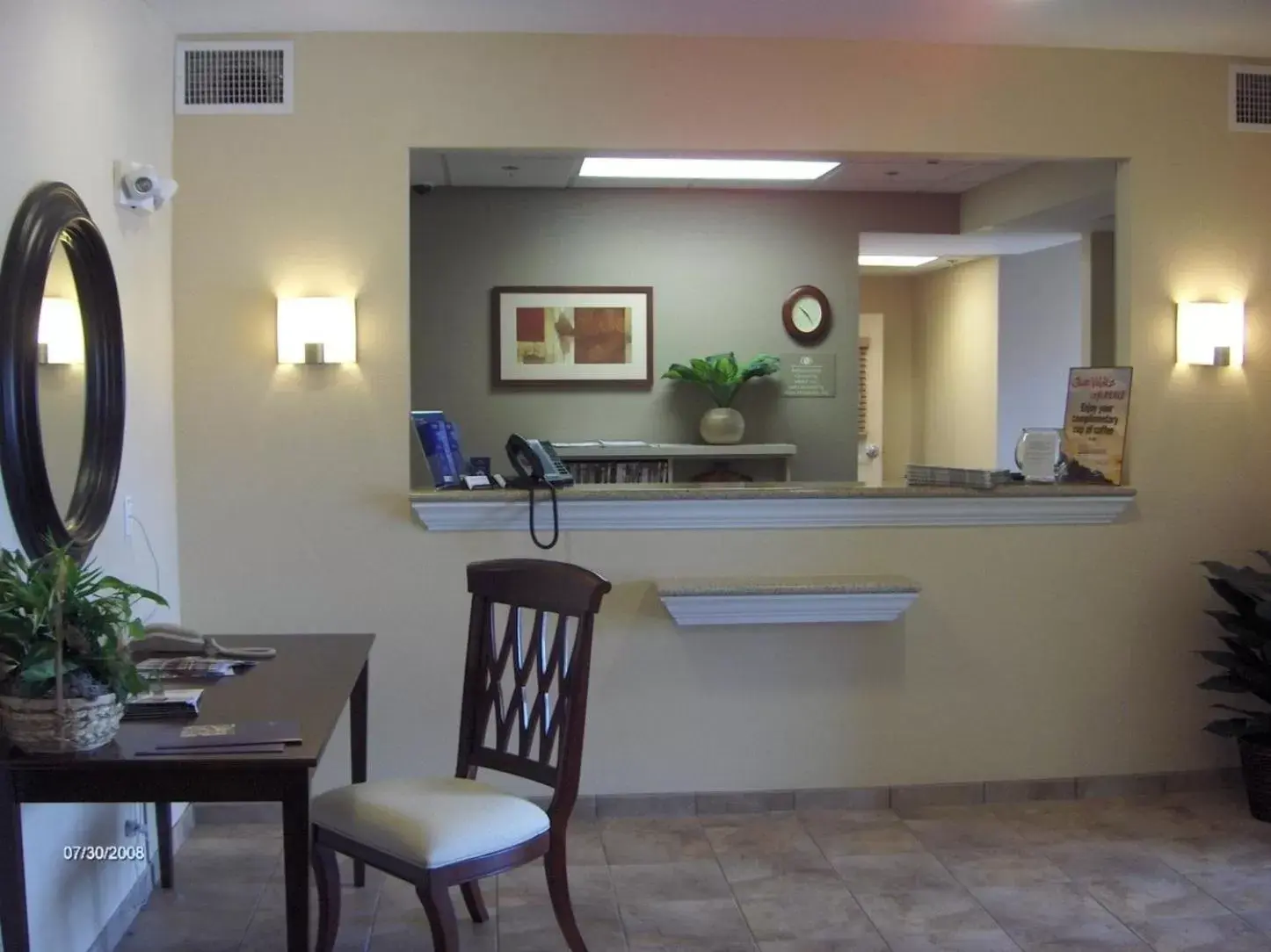 Lobby or reception, Kitchen/Kitchenette in Candlewood Suites Paducah, an IHG Hotel