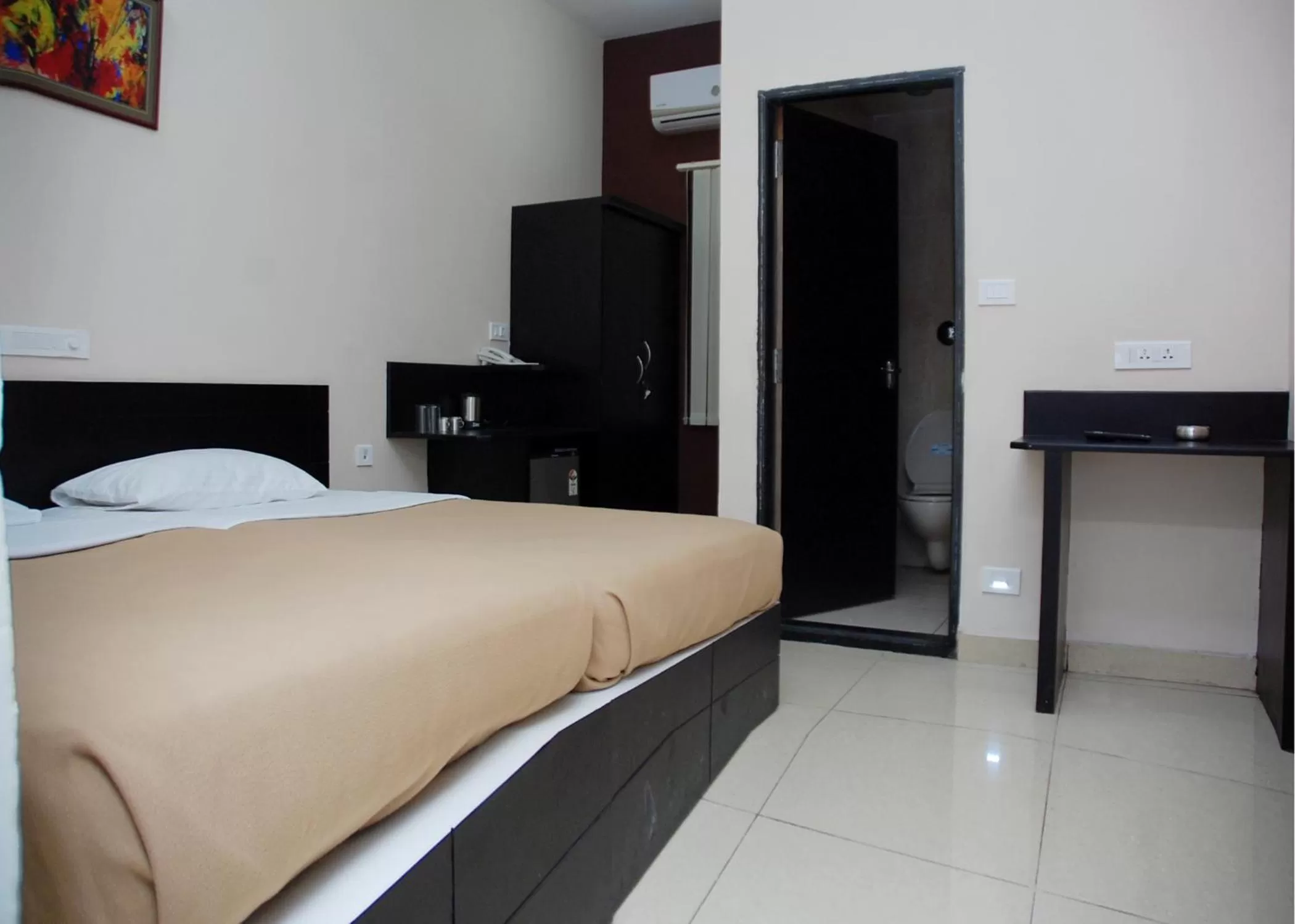 Bed in Hotel Sri Krishna Residency