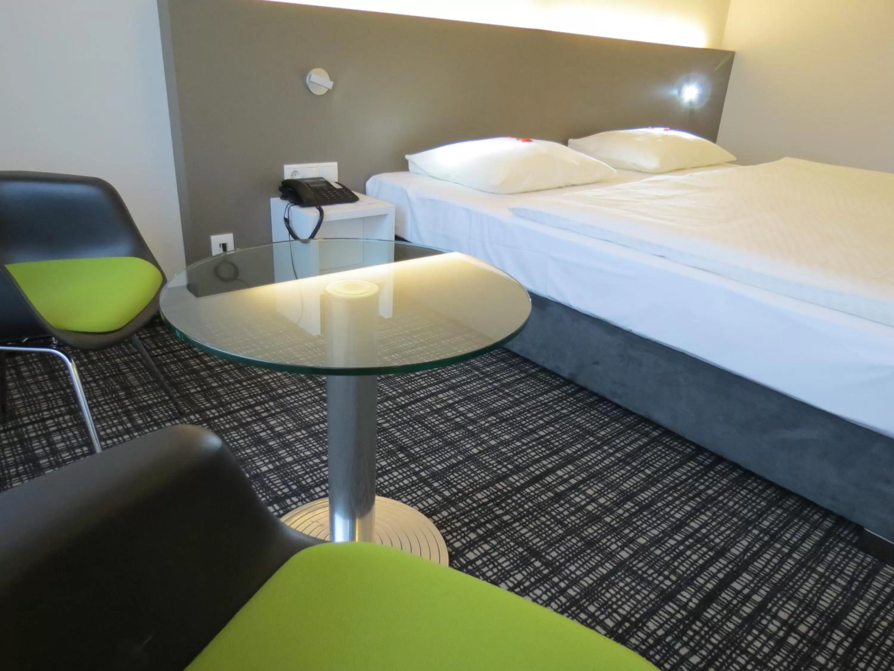 Bed in Comfor Hotel Ulm City