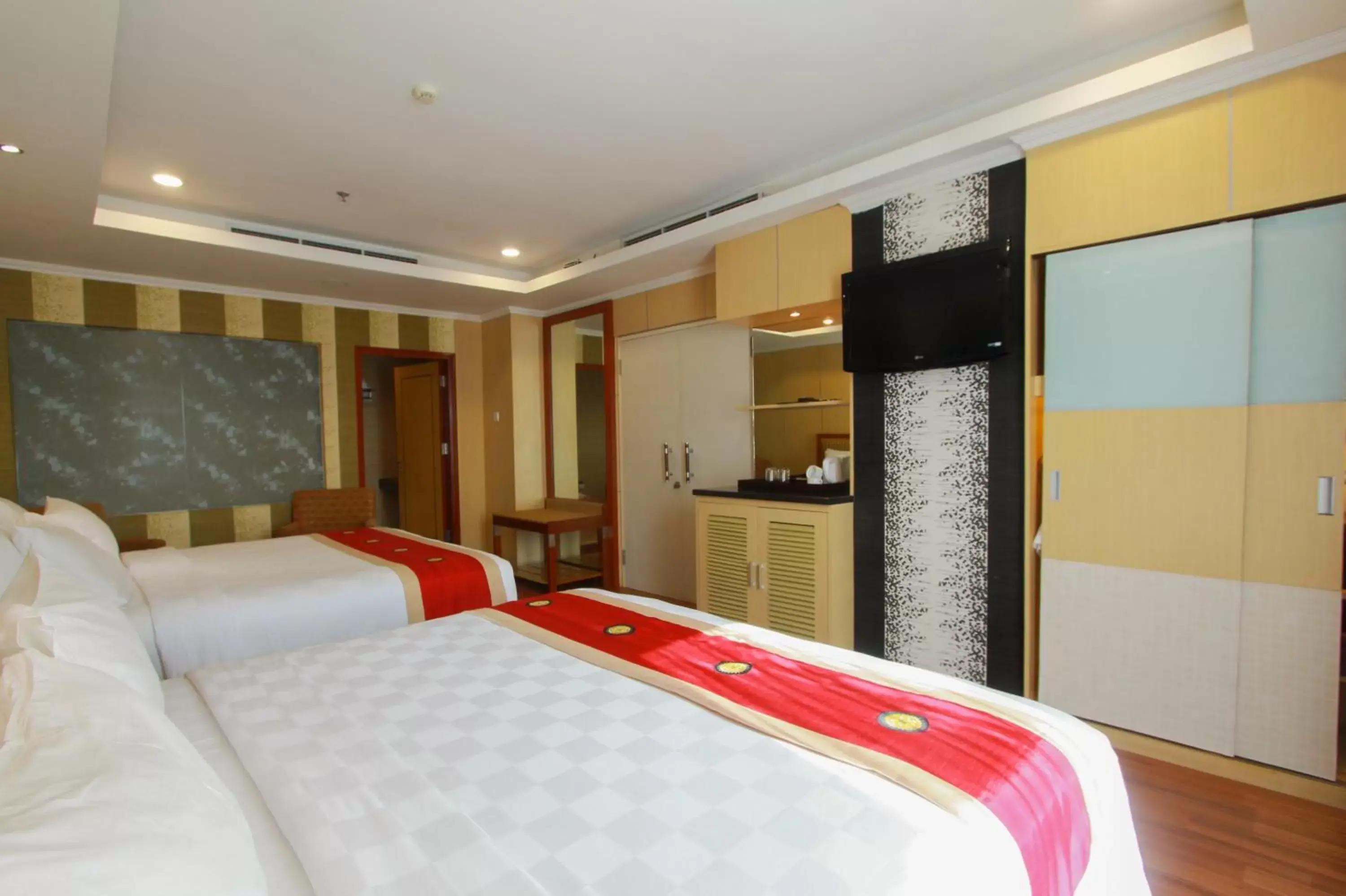 Photo of the whole room, Bed in Swiss-Belhotel Maleosan Manado