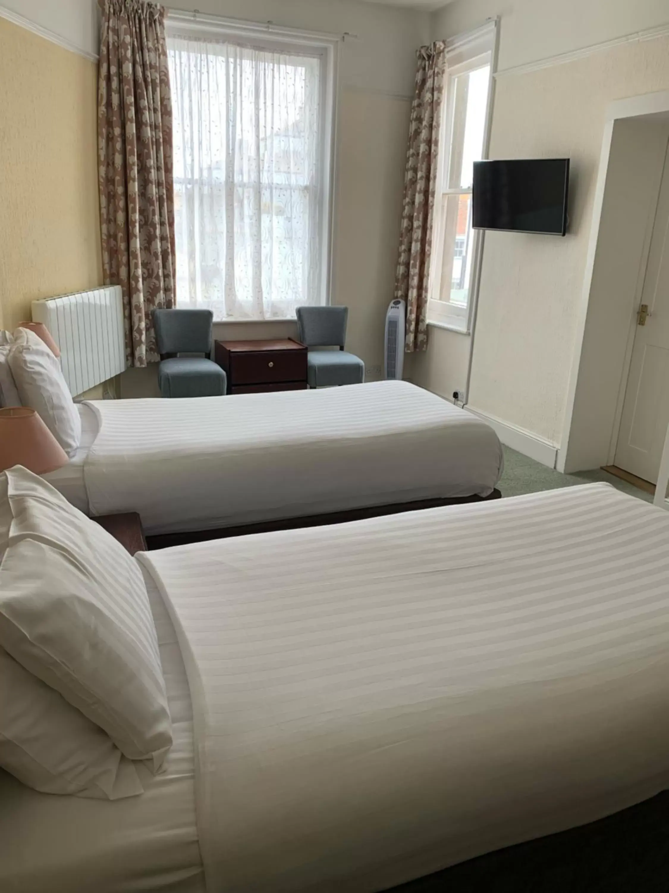 Bed in Royal Esplanade Hotel