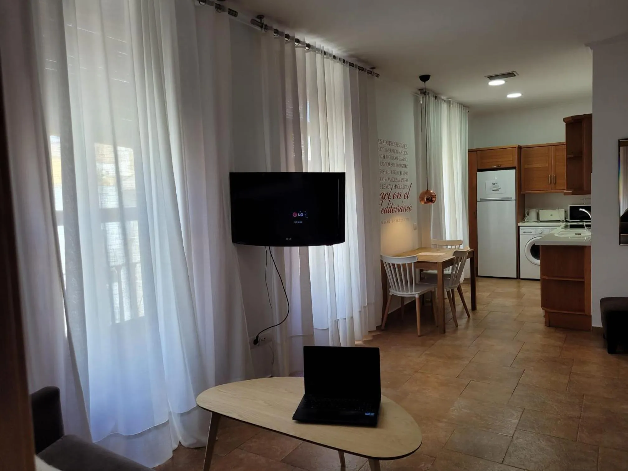 TV and multimedia in Living Valencia Apartments - Merced