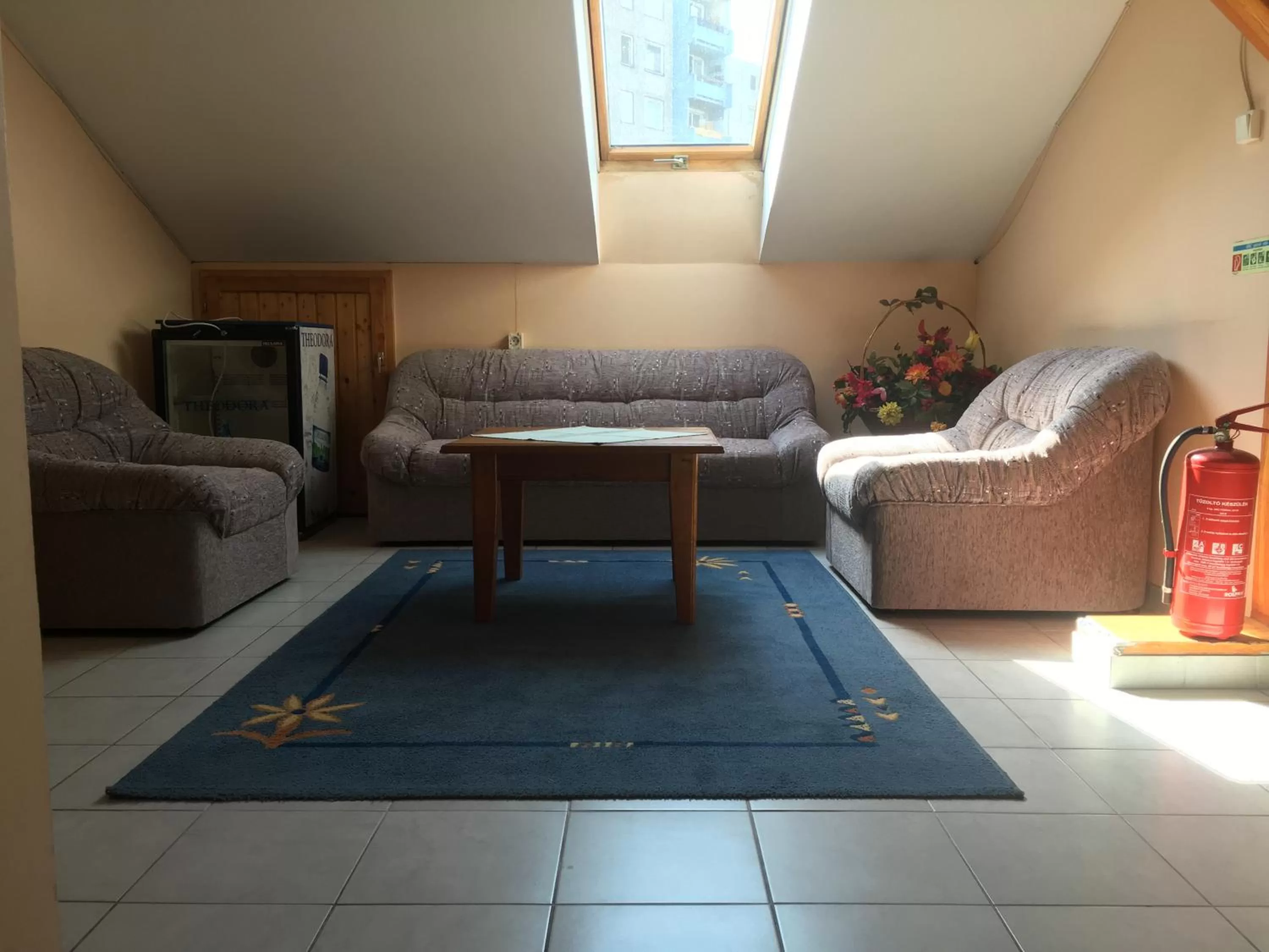 Communal lounge/ TV room in City Hotel Siófok