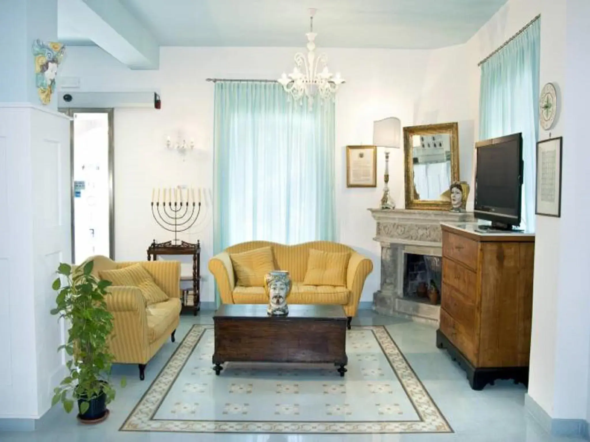 Communal lounge/ TV room, Seating Area in Hotel Villa Nefele