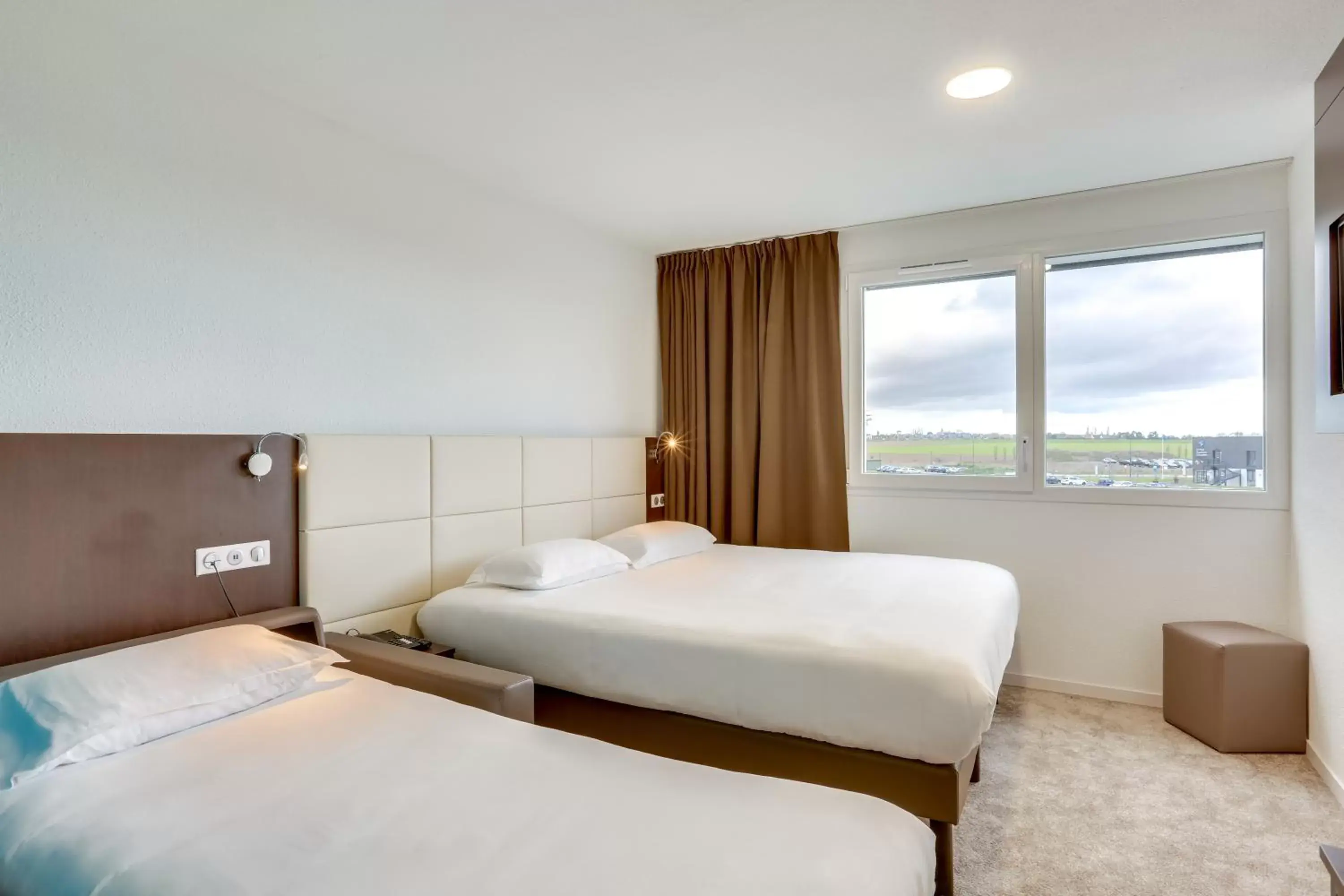 Triple Room (1 Double Bed and 1 Sofa bed) in Inspiration by balladins Caen Mémorial Triple Room (1 Double Bed and 1 Sofa bed) in Inspiration by balladins Caen Mémorial