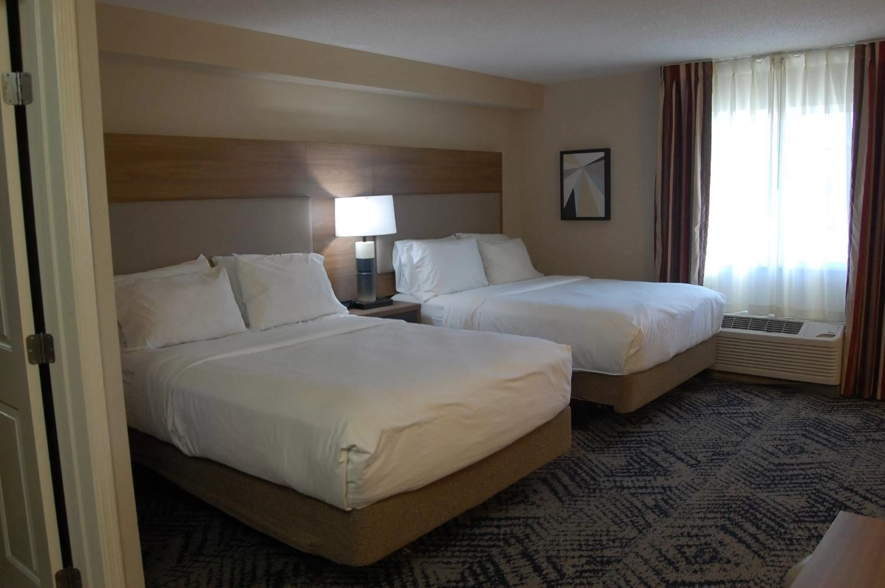 Photo of the whole room, Bed in Candlewood Suites Harrisburg I-81 Hershey Area by IHG