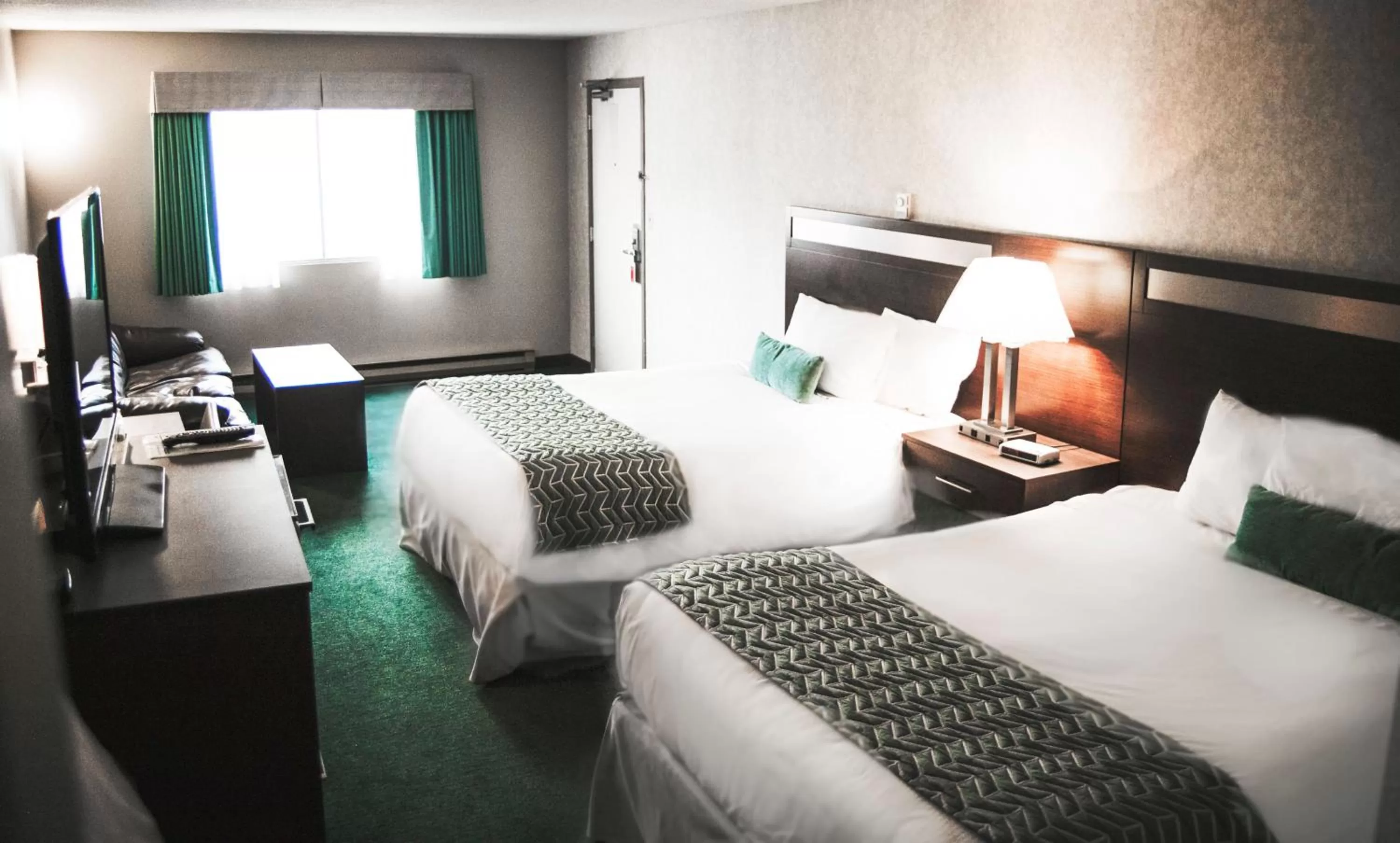 Bed in Ramada by Wyndham