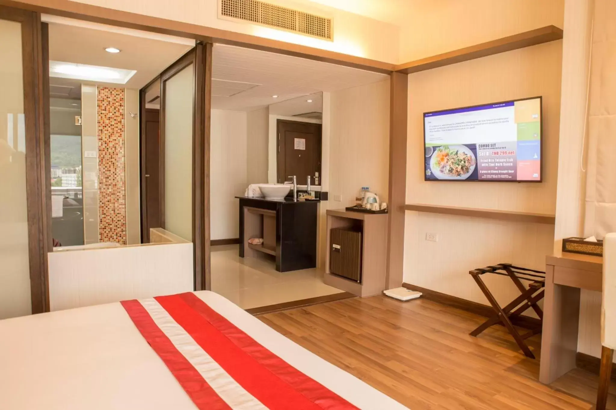 Bed, TV/Entertainment Center in Chiangmai Grandview Hotel & Convention Center - SHA Extra Plus