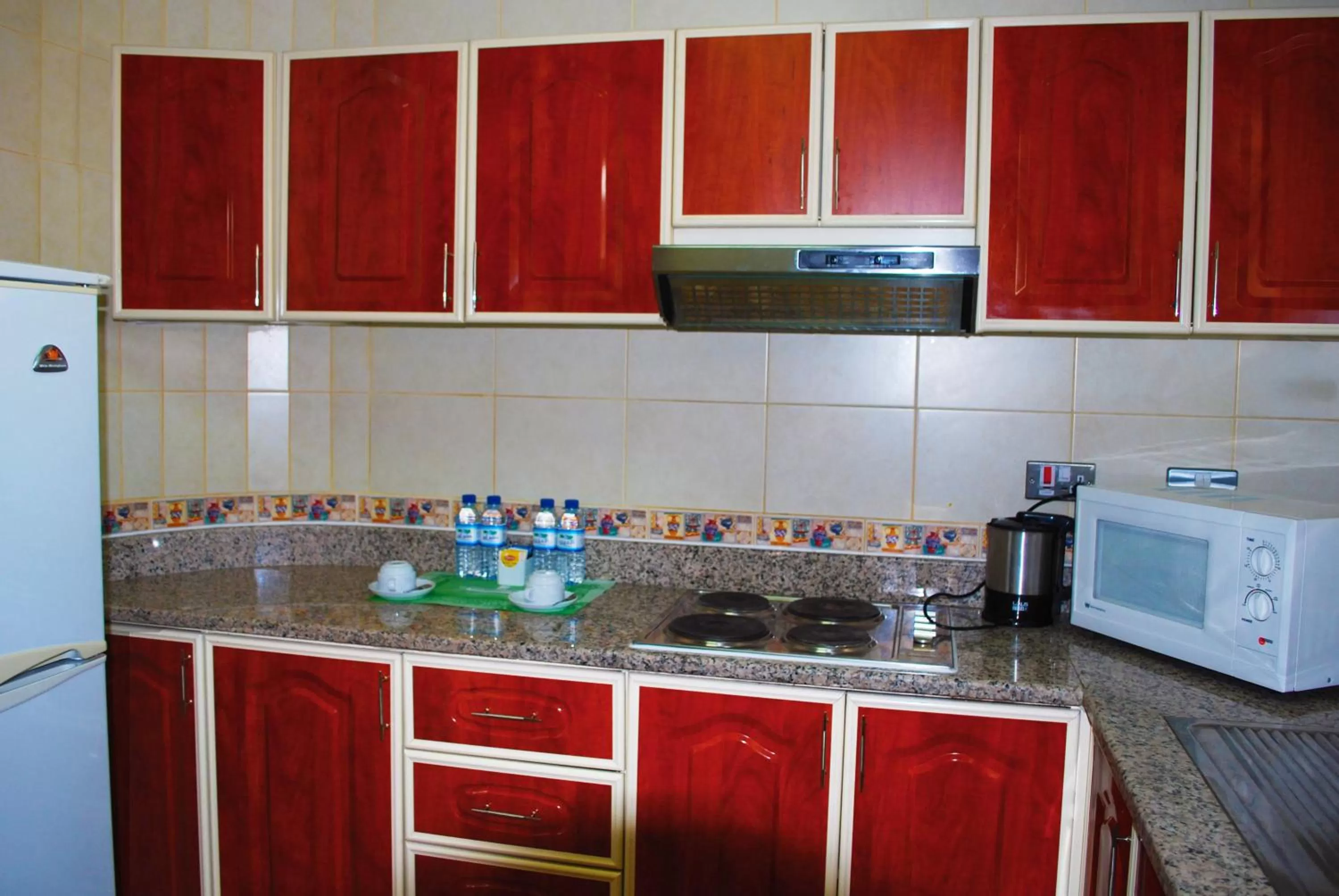 Kitchen or kitchenette in Green Mubazzarah Chalets