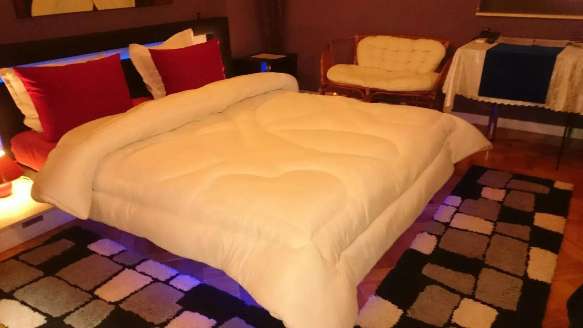 Bed in Rimini Club Inn & Suites