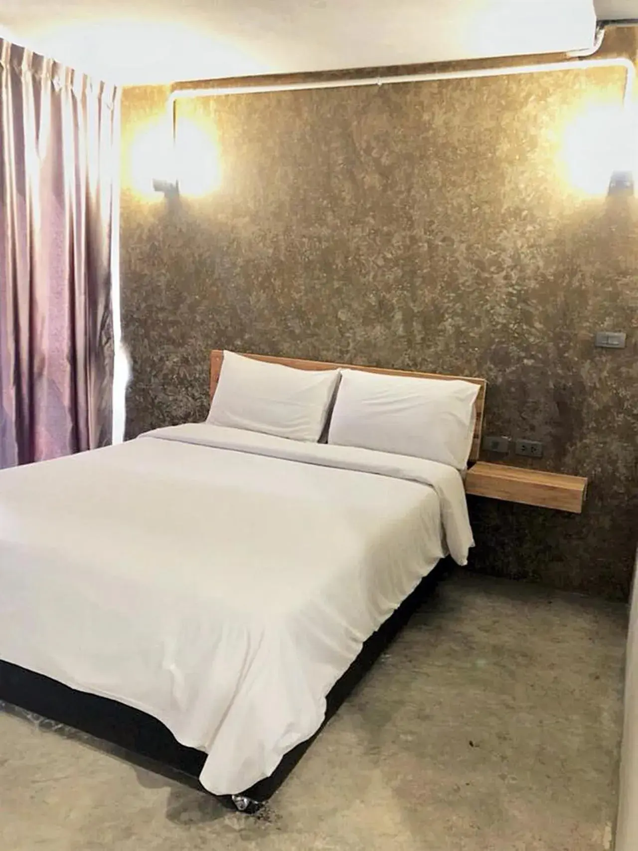 Bed in IZEN Budget Hotel & Residences (Plus)