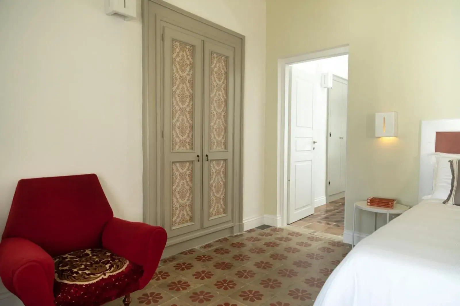 Bedroom, Seating Area in Relais San Martino - Albergo della Felicità by Ria Hotels